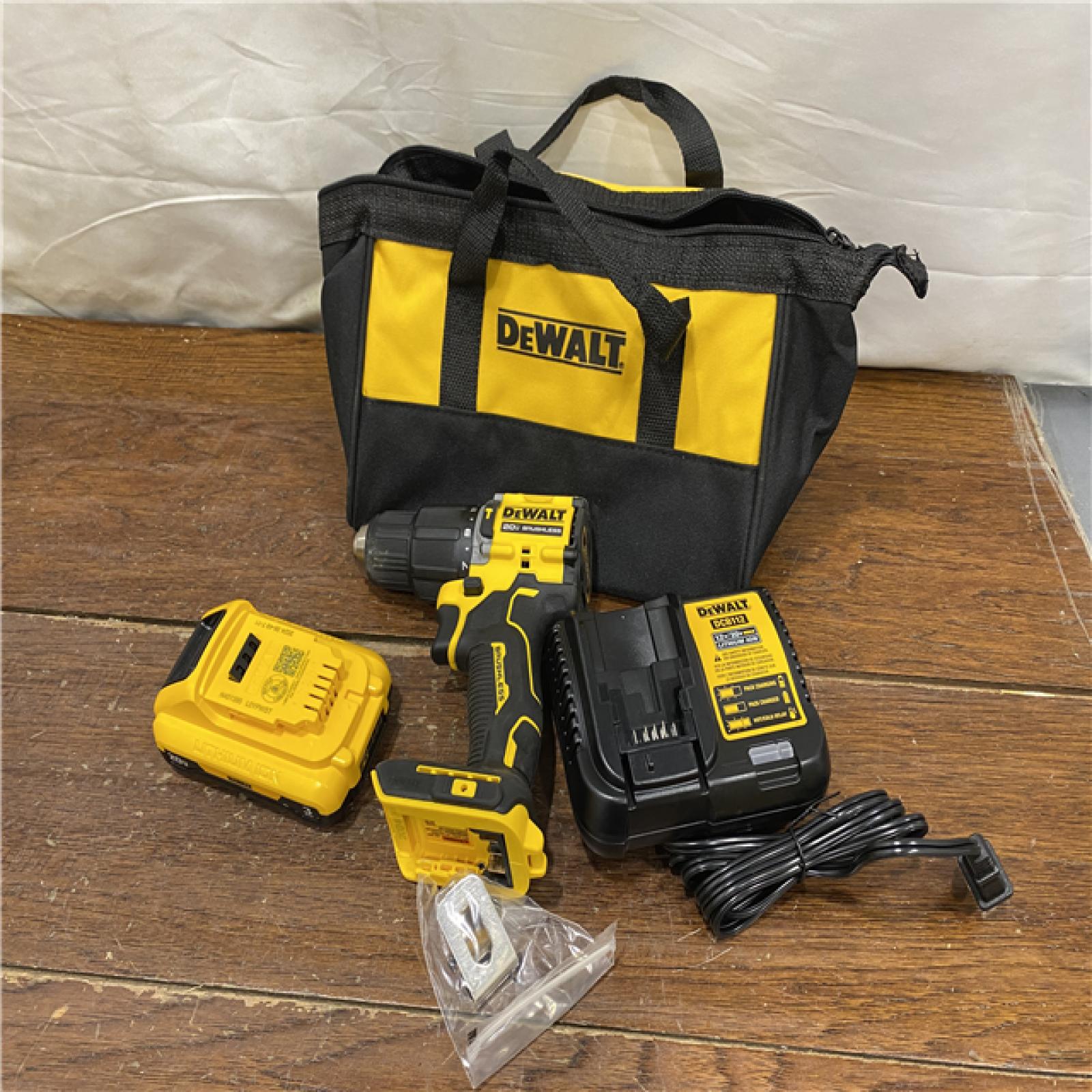 AS-IS DEWALT ATOMIC 20-Volt Lithium-Ion Cordless 1/2 in. Compact Hammer Drill with 3.0Ah Battery, Charger and Bag