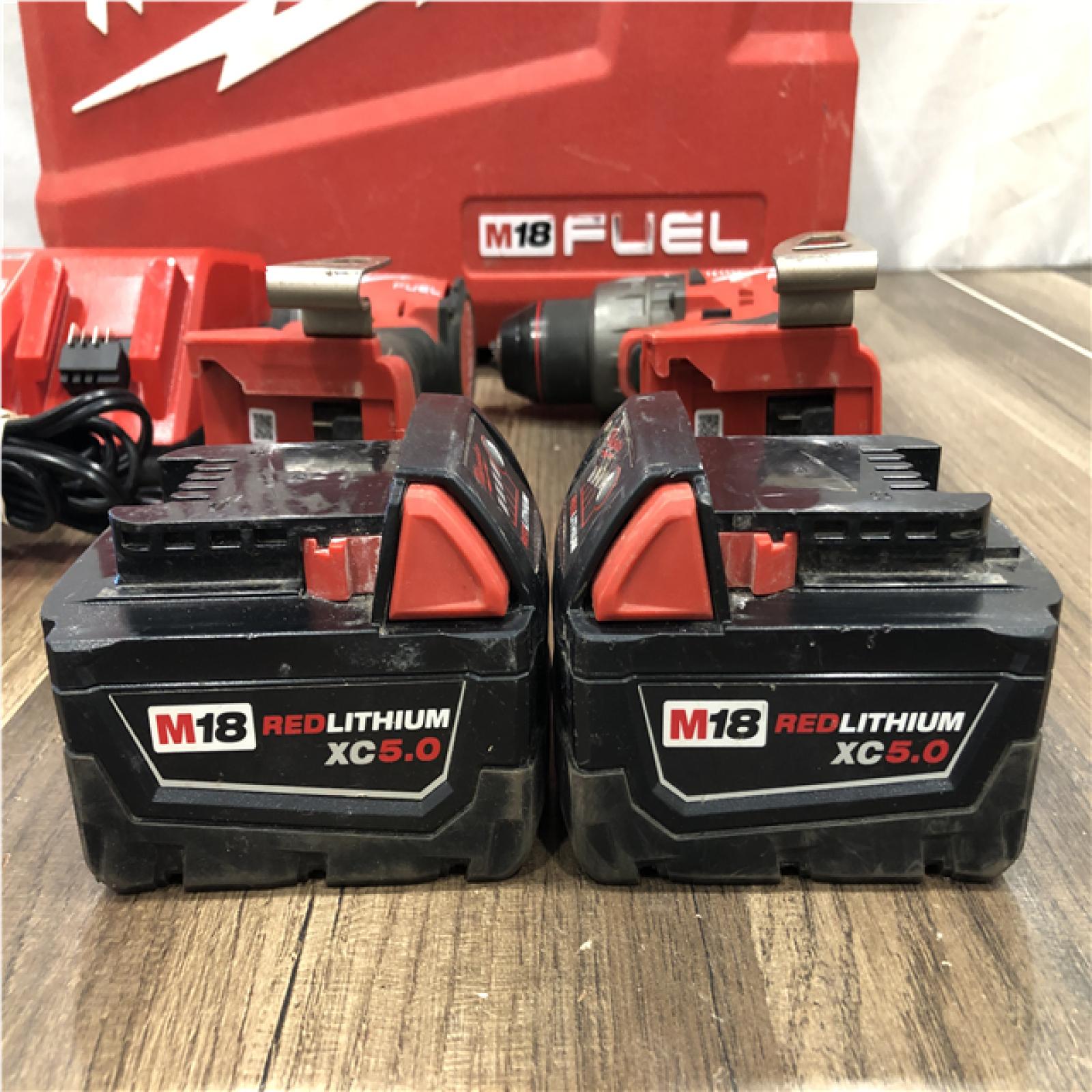 AS-IS Milwaukee FUEL 18V Lithium-Ion Brushless Cordless Hammer Drill and Impact Driver Combo Kit