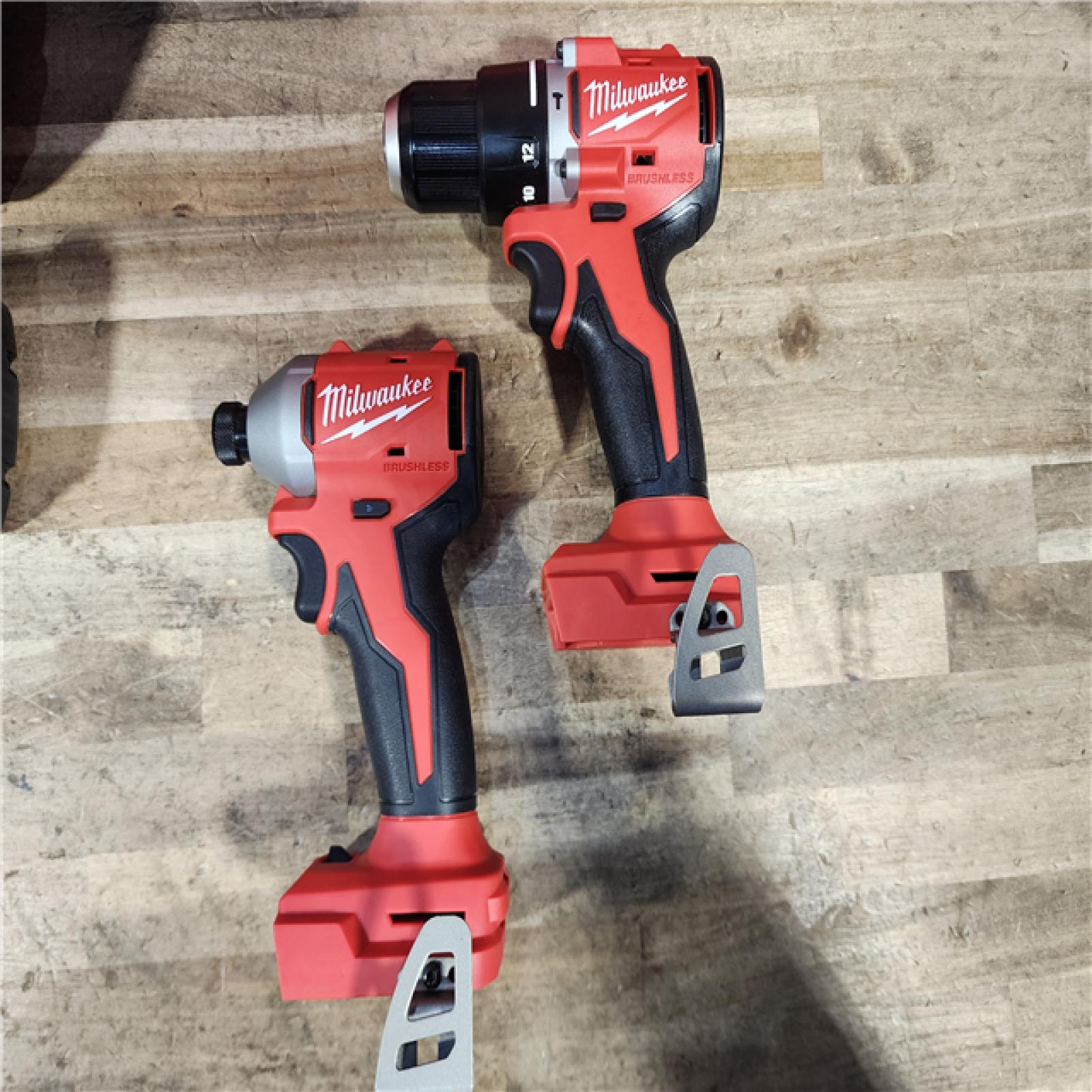 HOUSTON LOCATION - AS-IS M18 18-Volt Lithium-Ion Brushless Cordless Compact Hammer Drill/Impact Combo Kit (2-Tool) with (2) Batteries, Bag