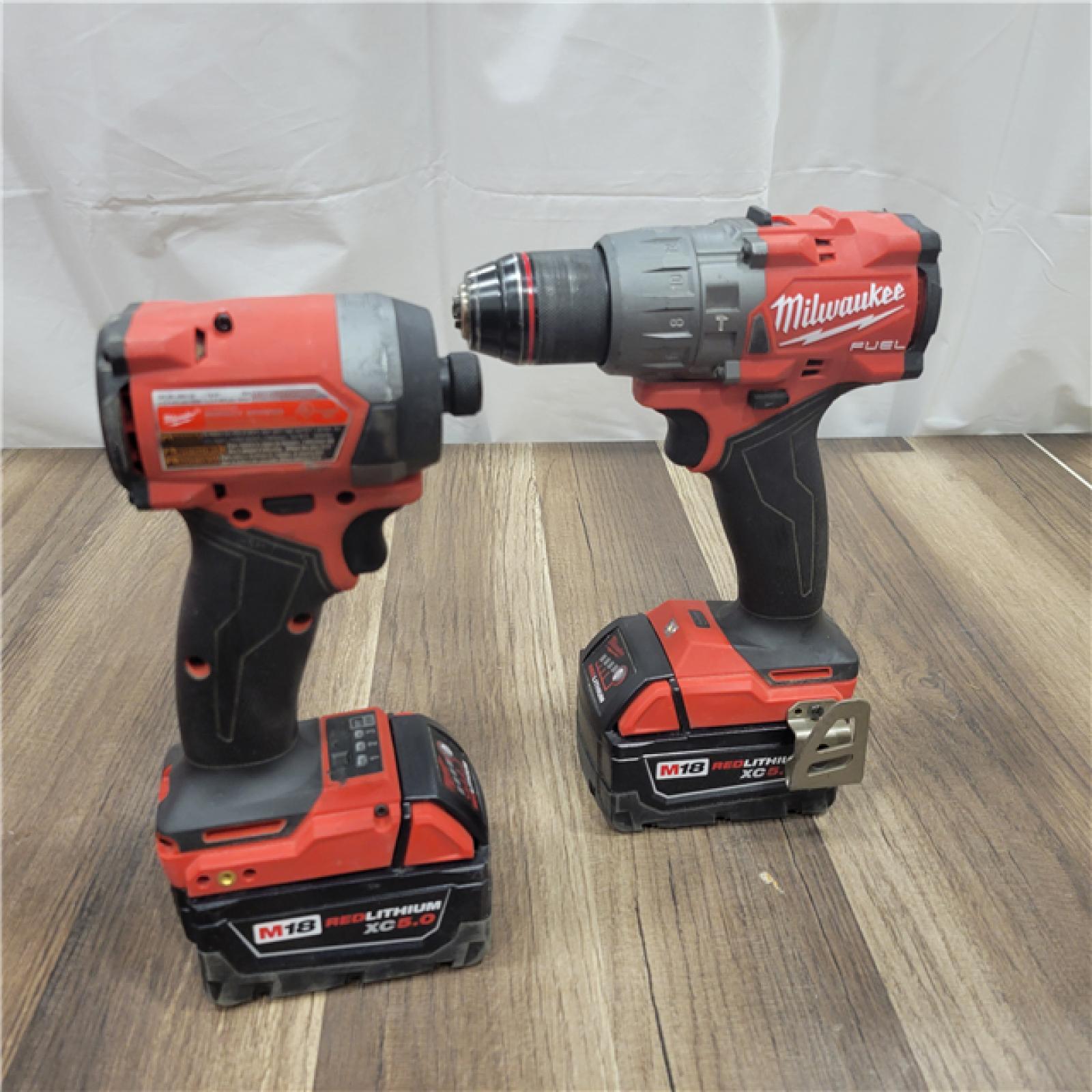AS-IS M18 FUEL 18V Lithium-Ion Brushless Cordless Hammer Drill and Impact Driver Combo Kit (2-Tool) with 2 Batteries