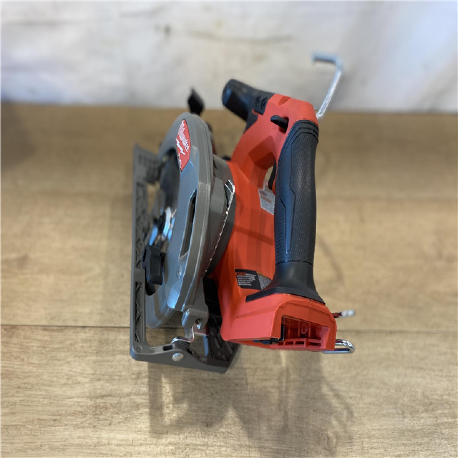 AS-IS Milwaukee FUEL 18V Lithium-Ion Brushless Cordless 6-1/2 in. Circular Saw (Tool-Only)