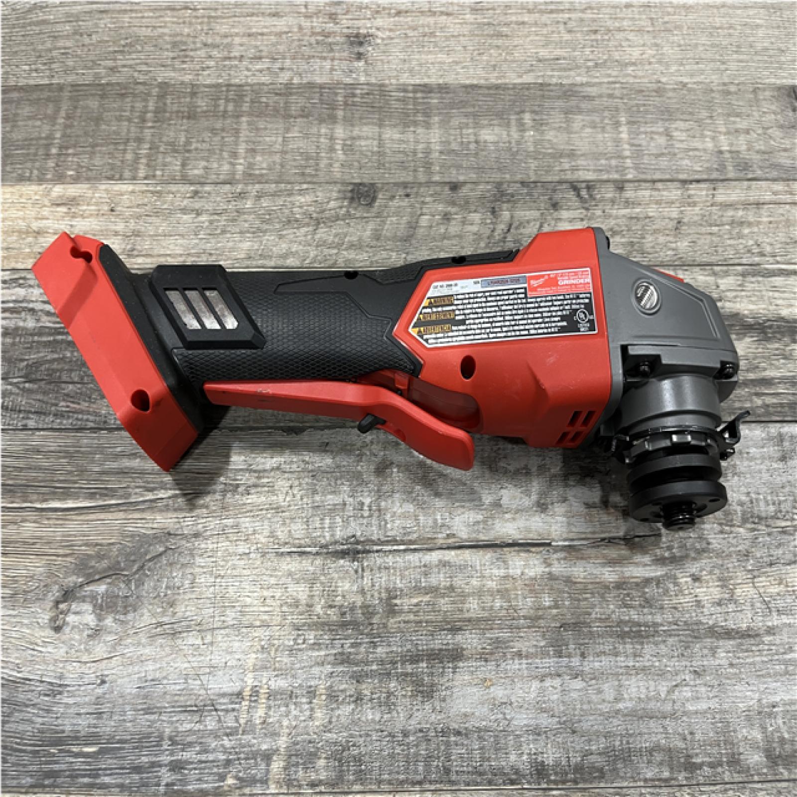 AS-IS Milwaukee FUEL 18V Lithium-Ion Brushless Cordless 4-1/2 in./5 in. Grinder with Variable Speed & Paddle Switch (Tool-Only)