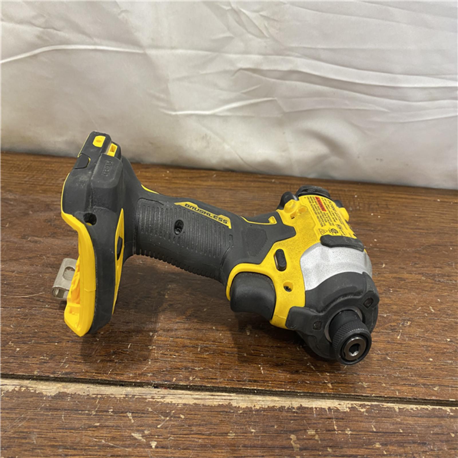 AS-IS DEWALT ATOMIC 20V MAX Lithium-Ion Cordless 1/4 in. Brushless Impact Driver Kit, 5 Ah Battery, Charger, and Bag