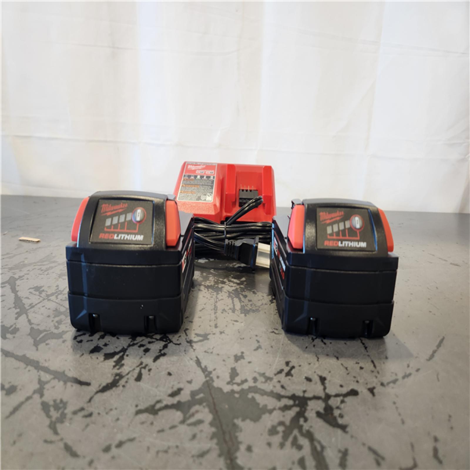 AS-IS- Milwaukee 18-Volt Lithium-Ion XC Starter Kit with Two 5.0Ah Batteries and Charger
