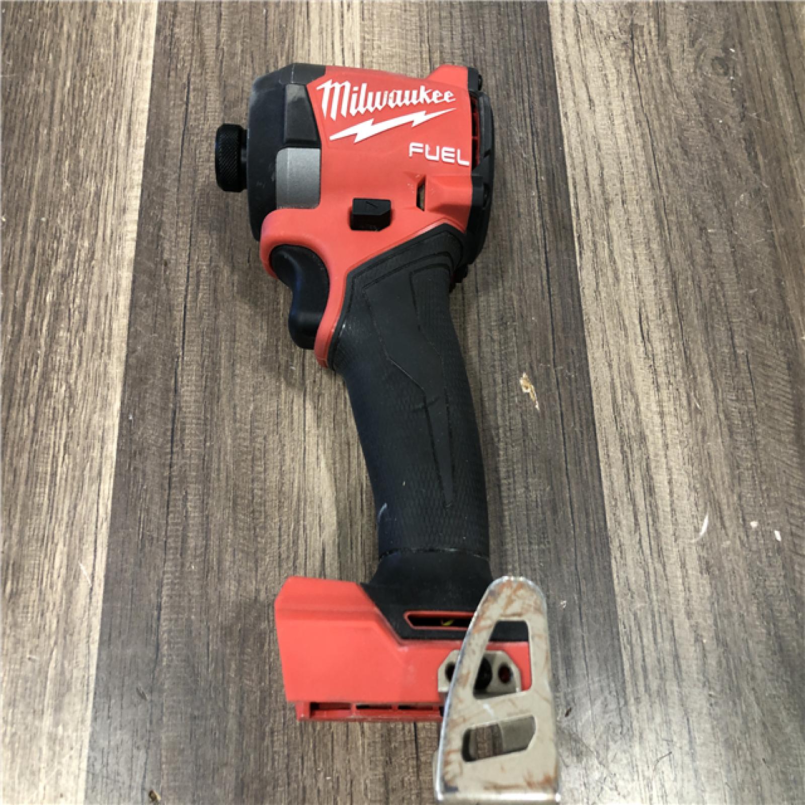 AS-IS Milwaukee  FUEL 18V Lithium-Ion Brushless Cordless 1/4 in. Hex Impact Driver (Tool-Only)