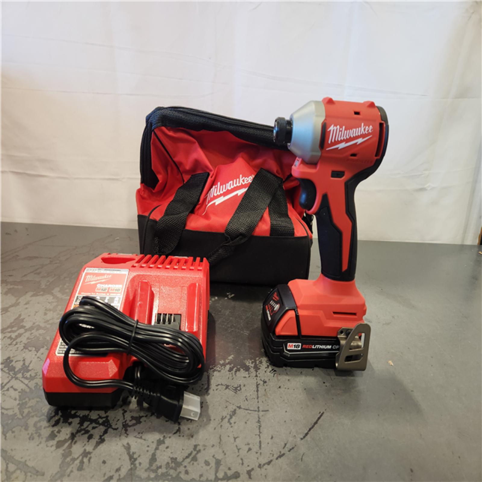 AS-IS- Milwaukee M18 Compact Brushless 1/4  Hex Impact Driver Kit
