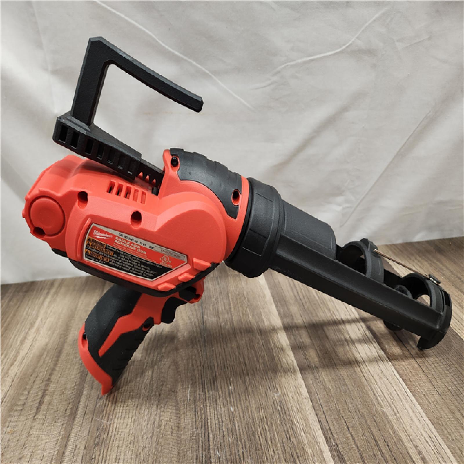 AS-IS- Milwaukee M12 12V Cordless 10oz Caulk/Adhesive Gun (Tool Only)