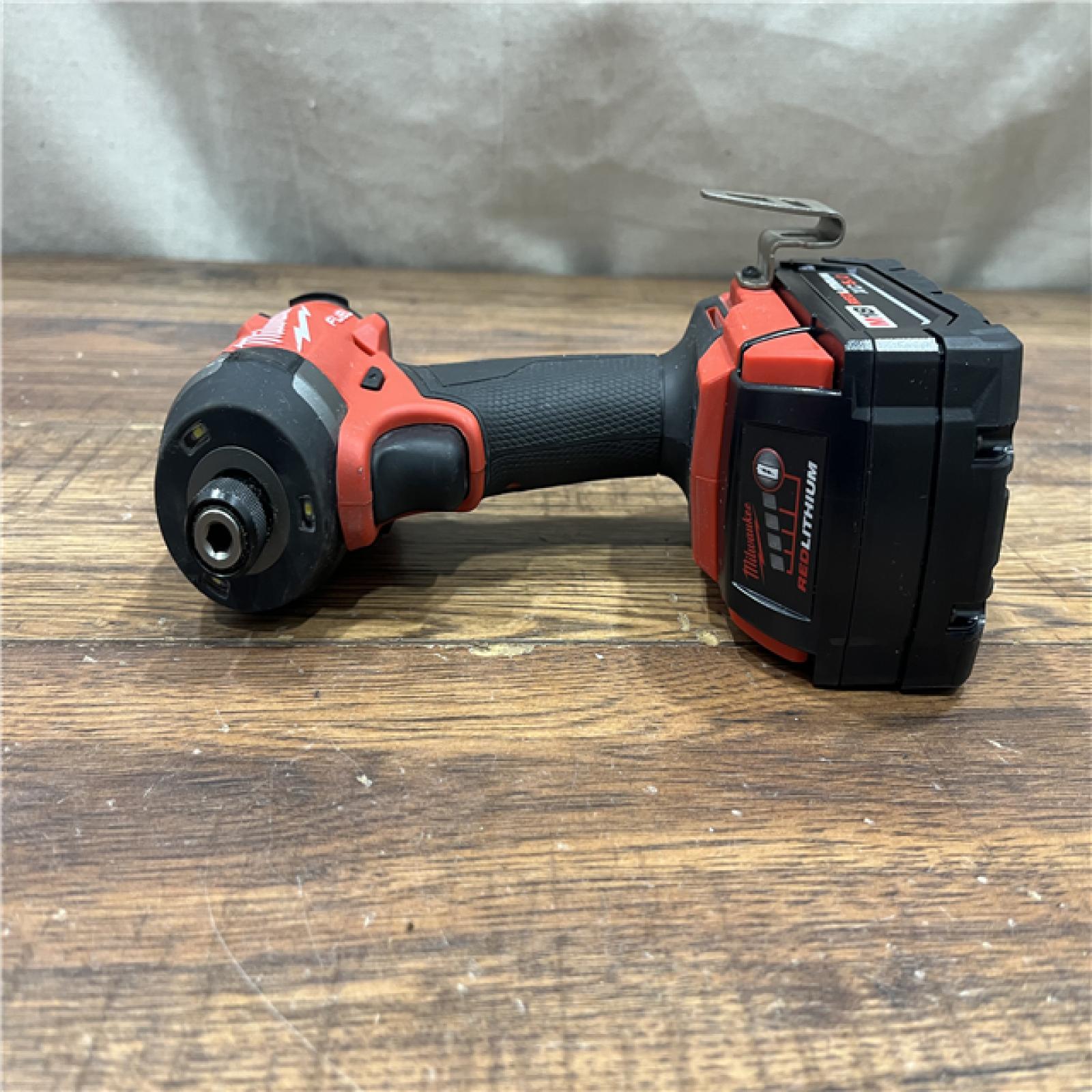 AS-IS MILWAUKEE M18 FUEL 18V Lithium-Ion Brushless Cordless Hammer Drill and Impact Driver Combo Kit (2-Tool) with 2 Batteries