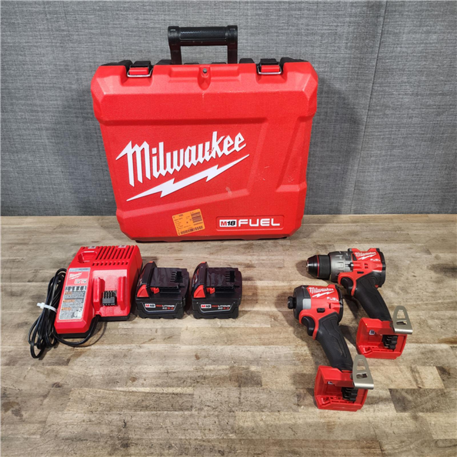 HOUSTON LOCATION - AS-IS MILWAUKEE FUEL 18V Lithium-Ion Brushless Cordless Hammer Drill and Impact Driver Combo Kit