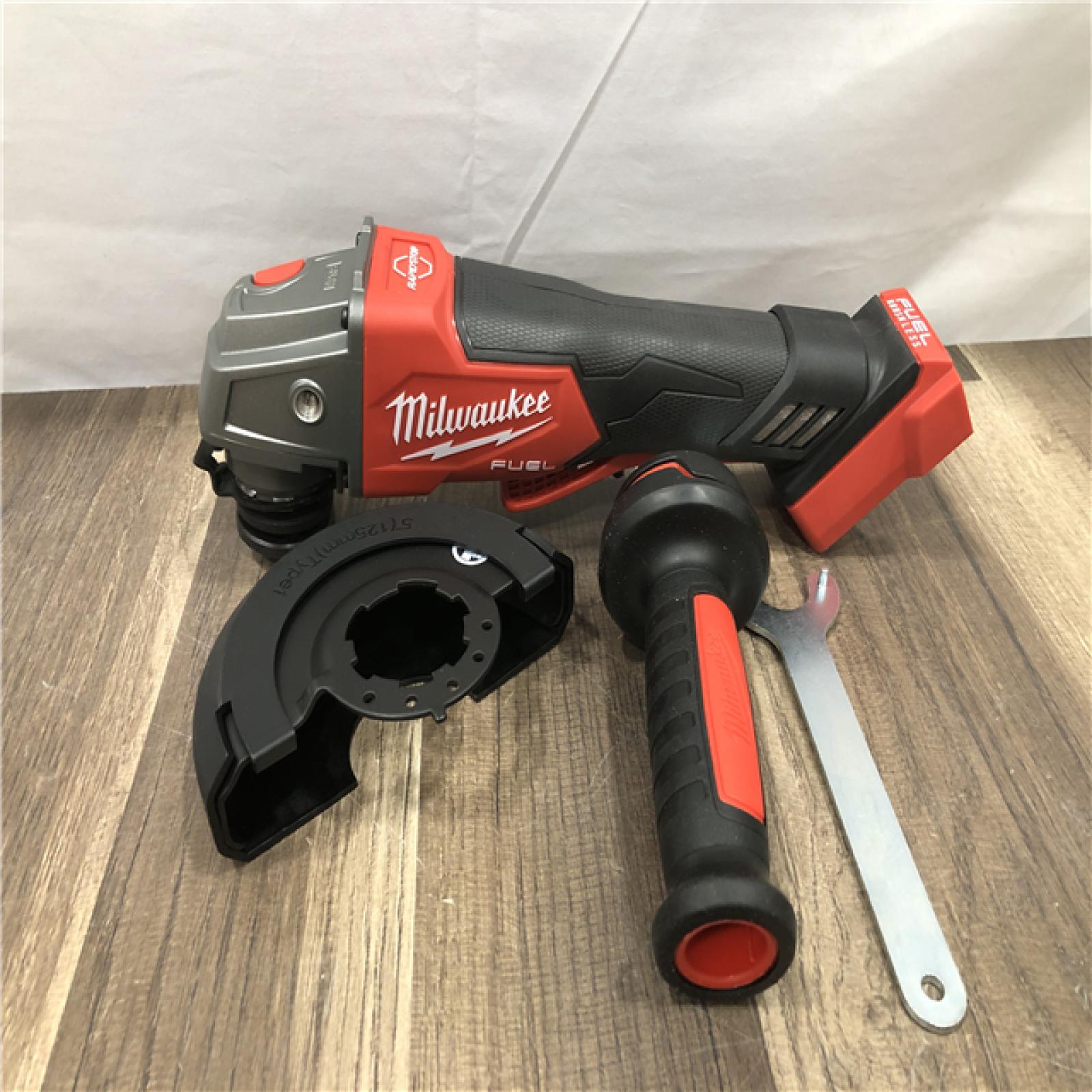 AS-IS Milwaukee FUEL 18V Lithium-Ion Brushless Cordless 4-1/2 in./5 in. Grinder w/Paddle Switch (Tool-Only)