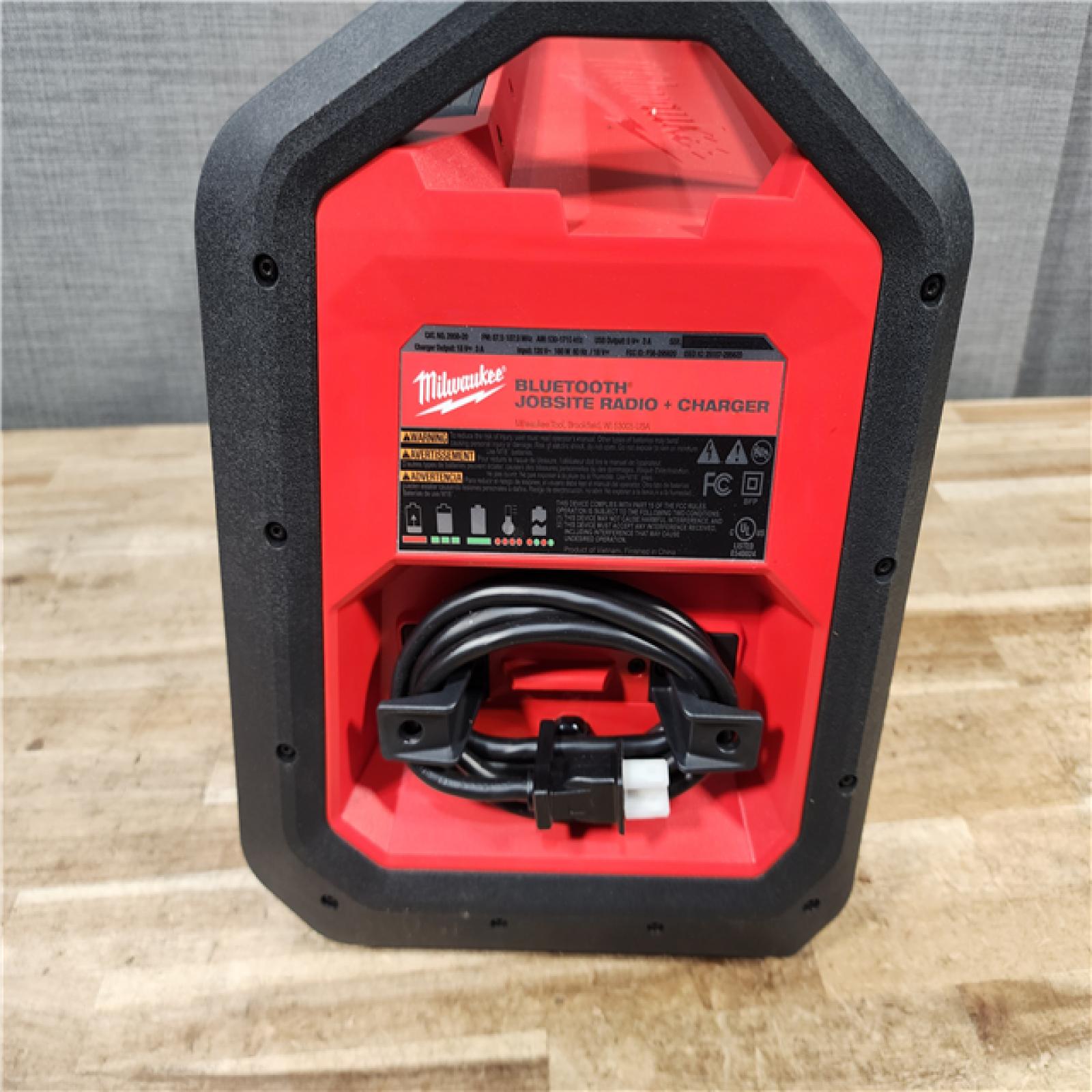 HOUSTON LOCATION - AS - IS Milwaukee Lithium-Ion Cordless PACKOUT Jobsite Radio/Speaker with Built-In Charger