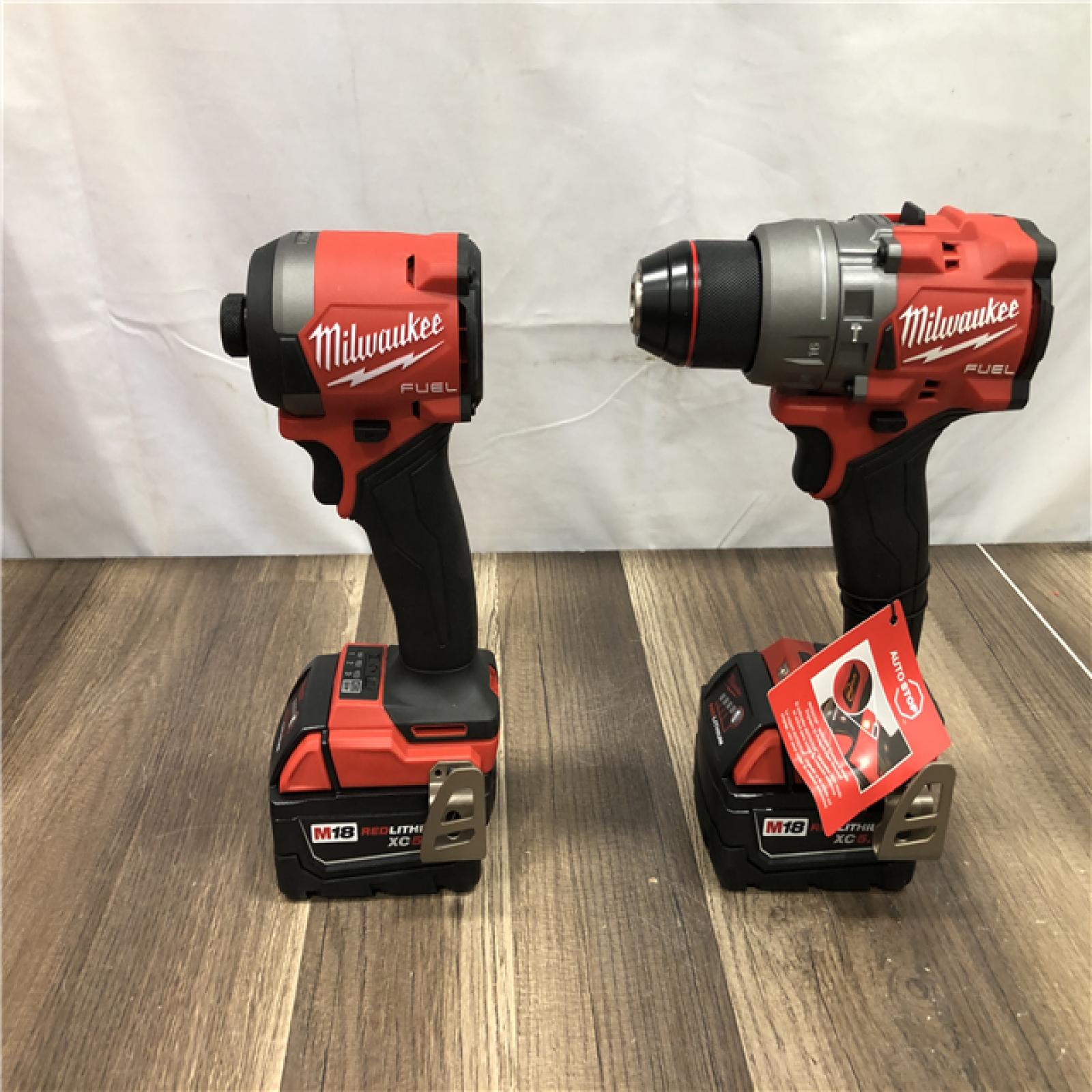 AS-IS Milwaukee FUEL 18V Lithium-Ion Brushless Cordless Hammer Drill and Impact Driver Combo Kit