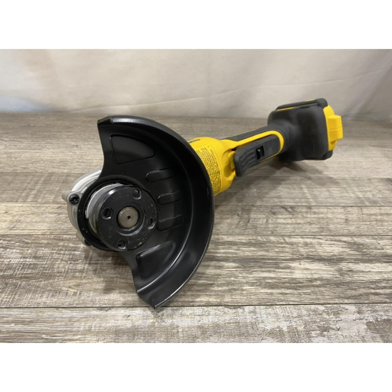 AS-IS DEWALT 20V MAX Cordless Brushless 4-1/2 in. Angle Grinder with Paddle Switch (Tool Only)