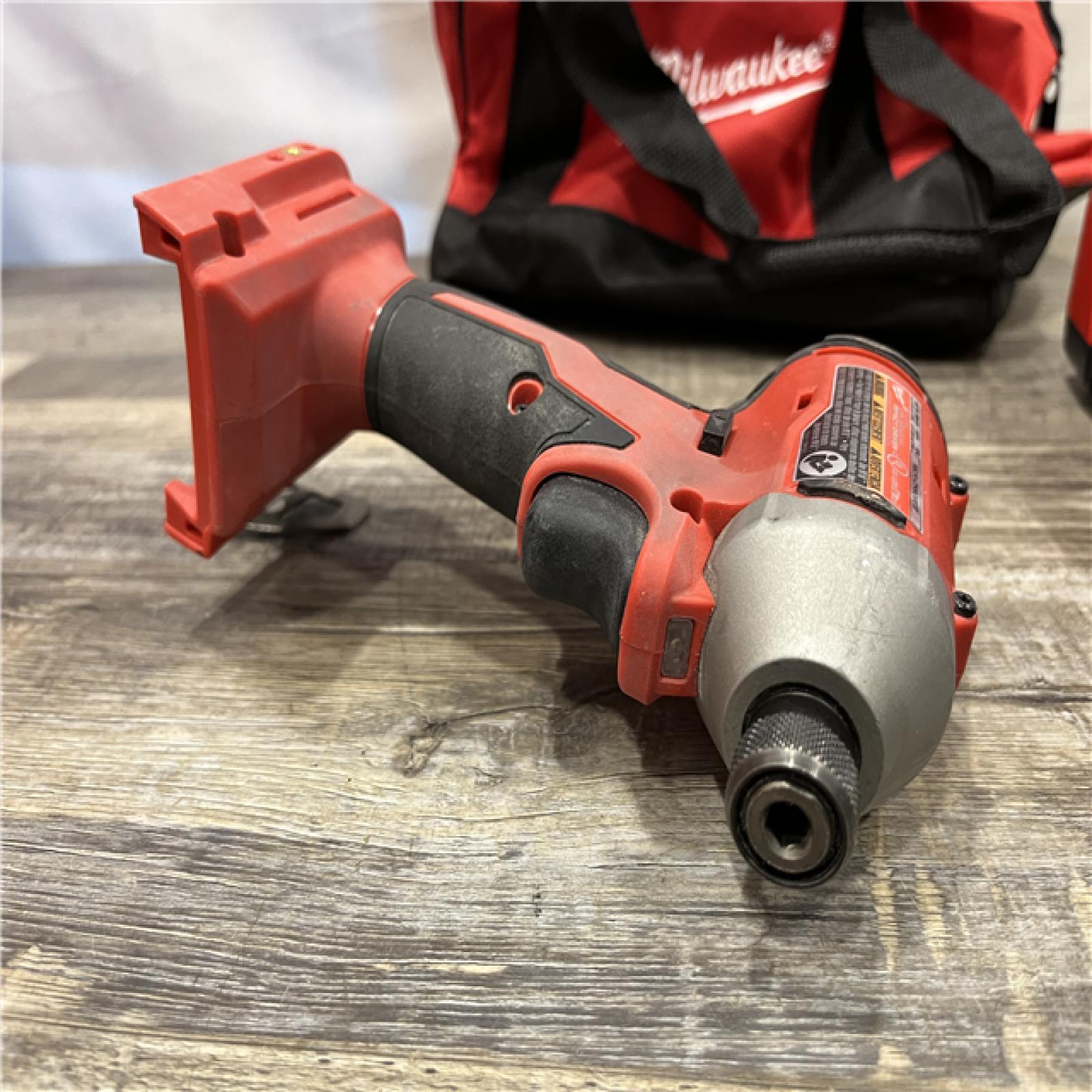 AS-IS Milwaukee 18V Lithium-Ion Brushless Cordless 1/4 in. Impact Driver Kit