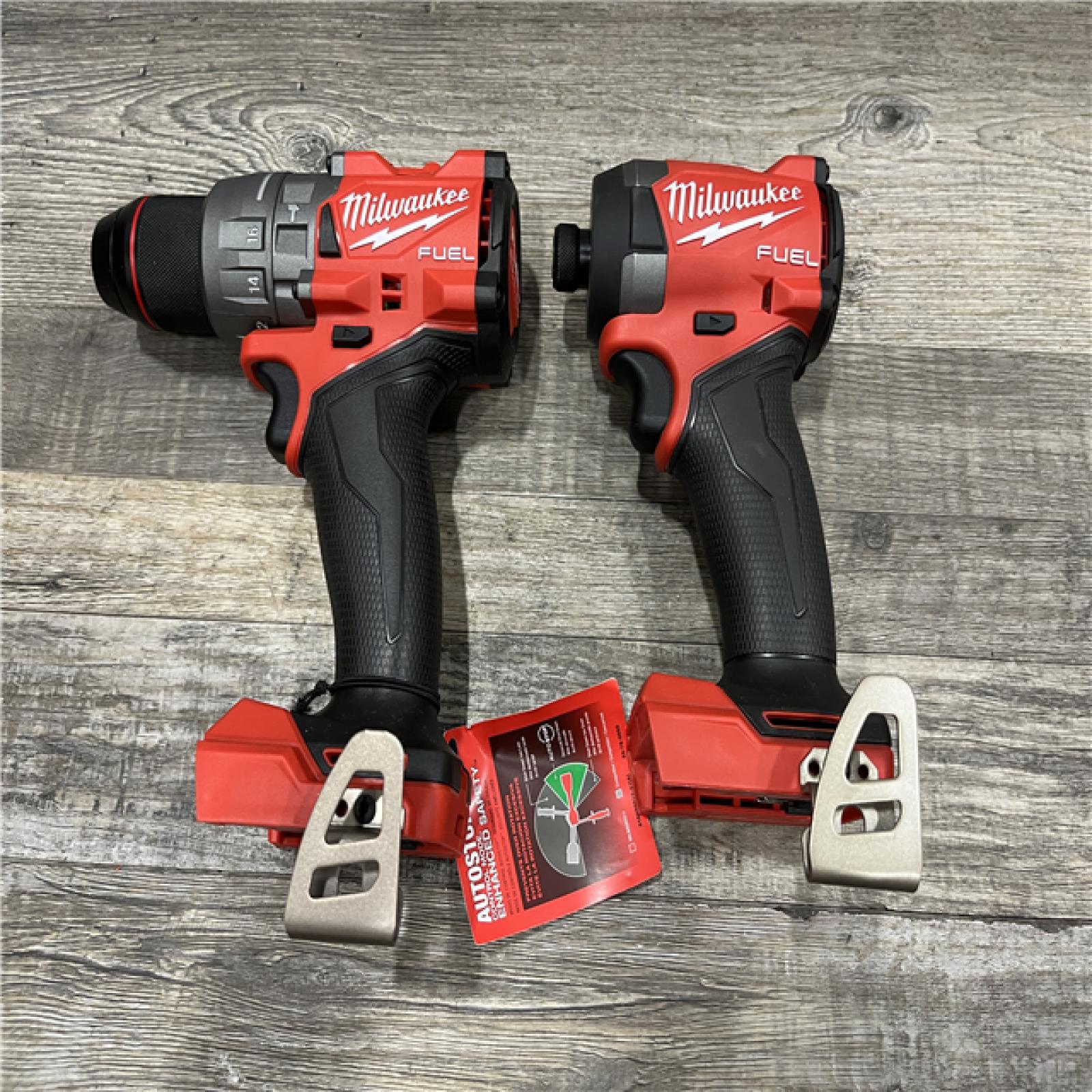 AS-IS Milwaukee FUEL 18V Lithium-Ion Brushless Cordless Hammer Drill and Impact Driver Combo Kit