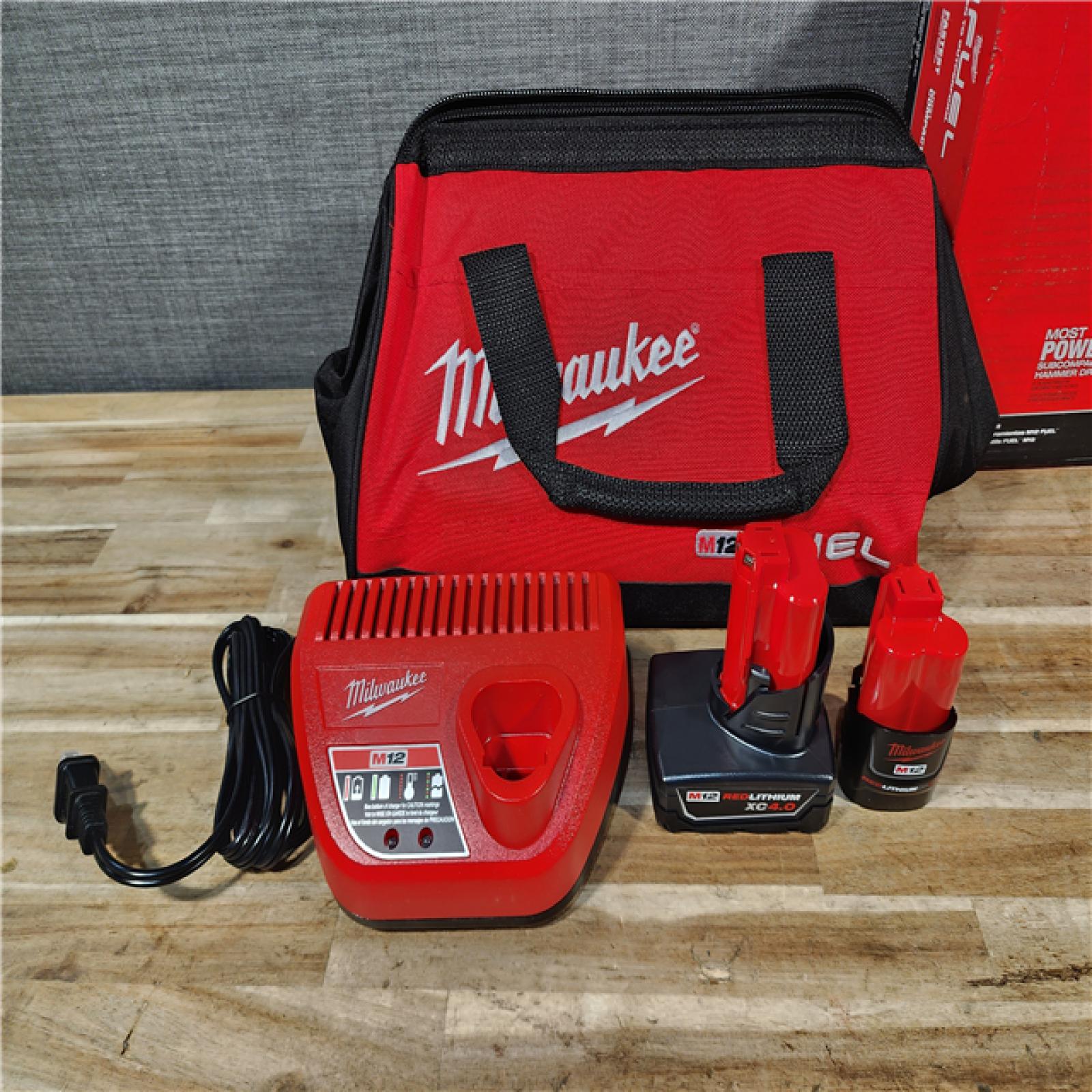 HOUSTON LOCATION - AS-IS (APPEARS LIKE NEW) Milwaukee  FUEL 12-Volt Lithium-Ion Brushless Cordless Hammer Drill and Impact Driver Combo Kit