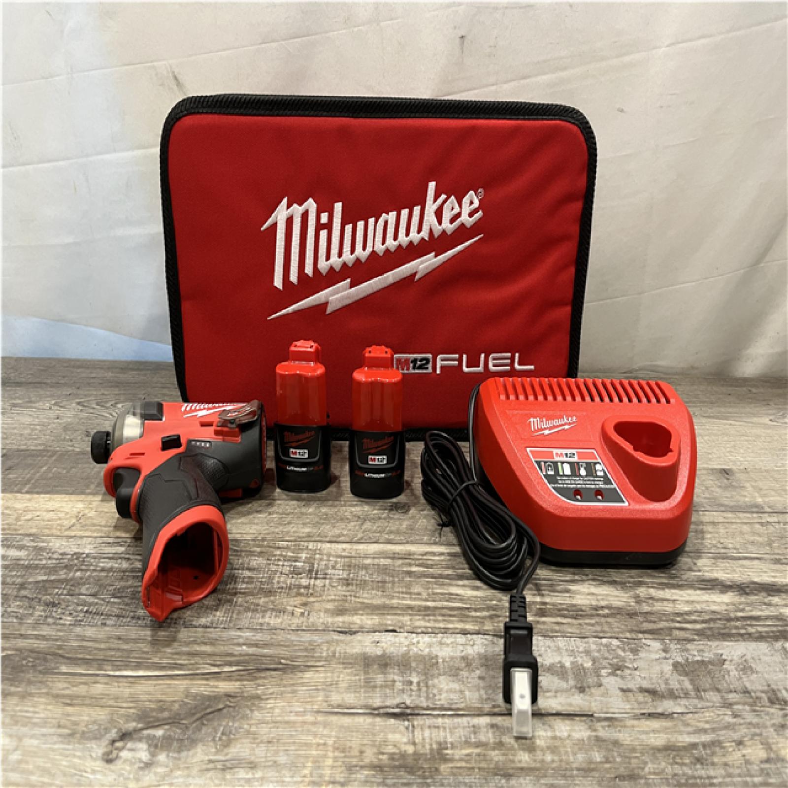 AS-IS Milwaukee FUEL SURGE 12V Lithium-Ion Brushless Cordless 1/4 in. Hex Impact Driver Compact Kit