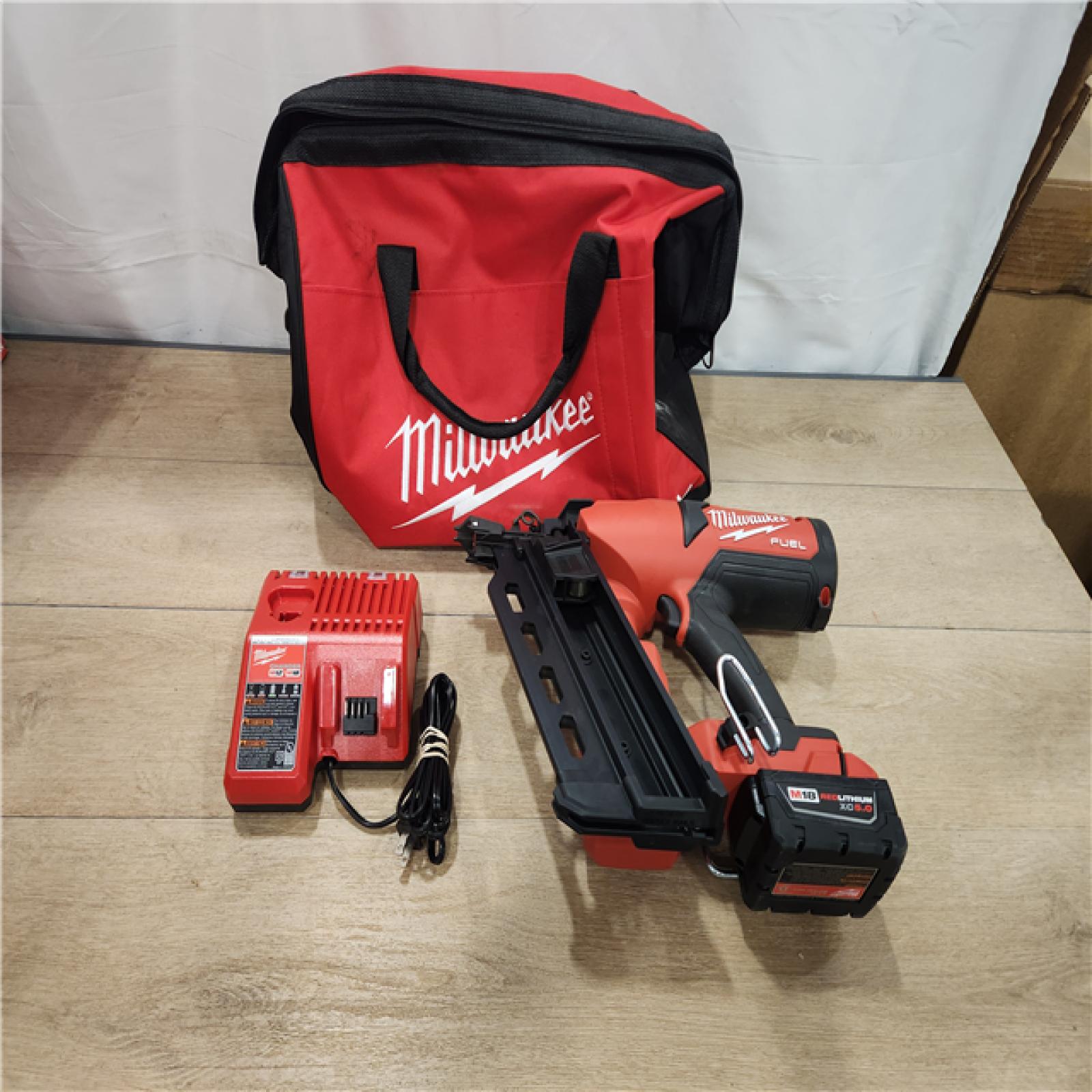 AS-IS- M18 FUEL 18-Volt Brushless Lithium-Ion Cordless 21-Degree Duplex Nailer Kit with 5Ah Battery and Charger