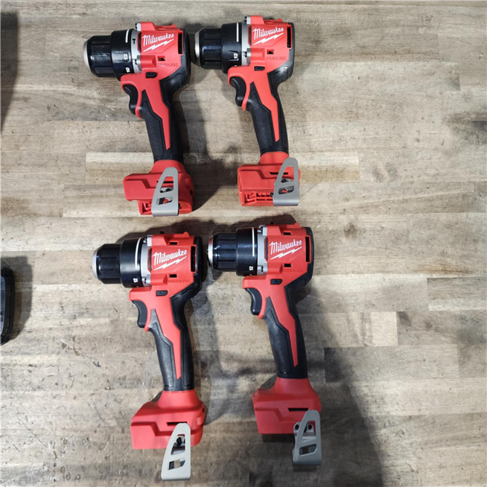 HOUSTON LOCATION - AS-IS MILWAUKEE 4 TOOL COMBO KIT W/ (2) BATTERY & CHARGER
