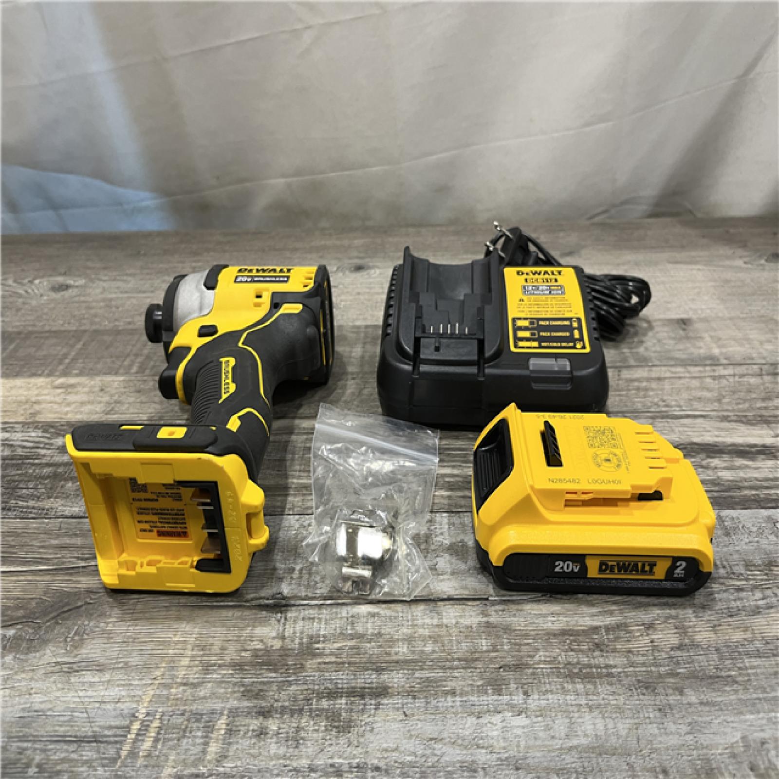AS-IS DEWALT Atomic 20V Max Lithium-Ion Brushless Cordless Compact 1/4 in. Impact Driver Kit