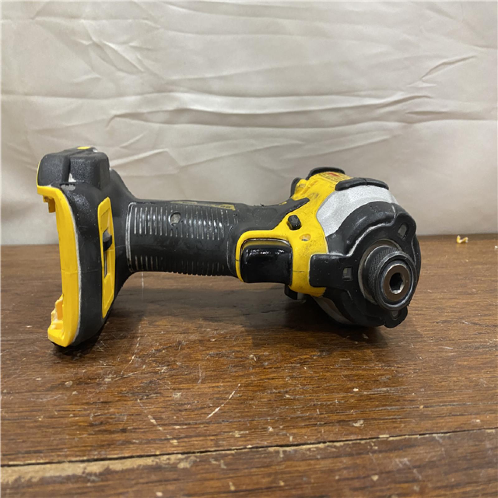 AS-IS DEWALT ATOMIC 20V MAX Lithium-Ion Cordless 1/4 in. Brushless Impact Driver Kit, 5 Ah Battery, Charger, and Bag