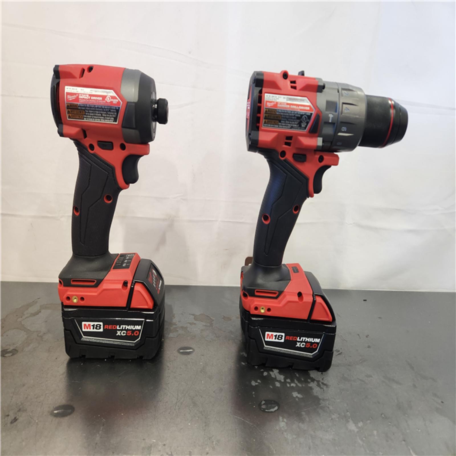 AS-IS- Milwaukee FUEL 18V Lithium-Ion Brushless Cordless Hammer Drill and Impact Driver Combo Kit