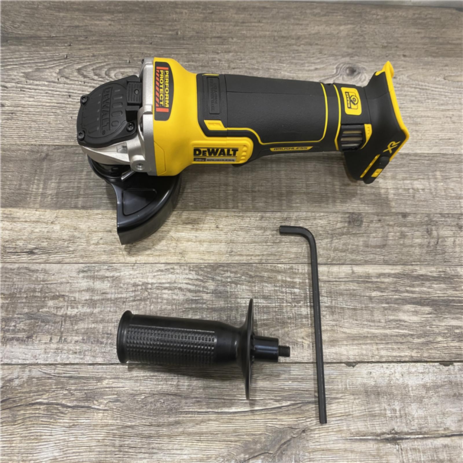 AS-IS DEWALT 20V MAX XR Cordless Brushless 4.5 in. Paddle Switch Small Angle Grinder with Kickback Brake (Tool Only)