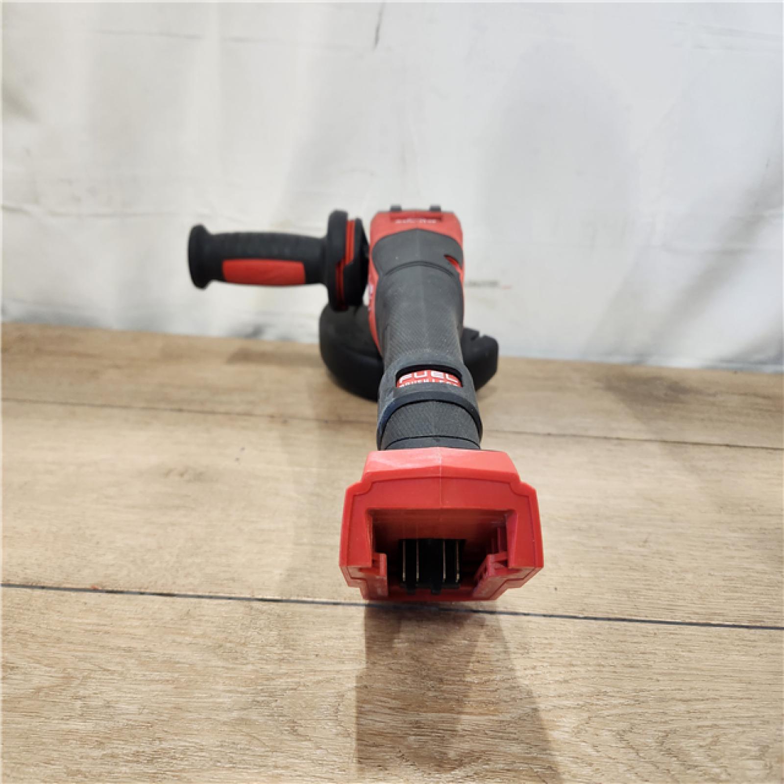 AS-IS- Milwaukee  FUEL 18-Volt Lithium-Ion Brushless Cordless 4-1/2 in./6 in. Braking Grinder with Paddle Switch (Tool-Only)