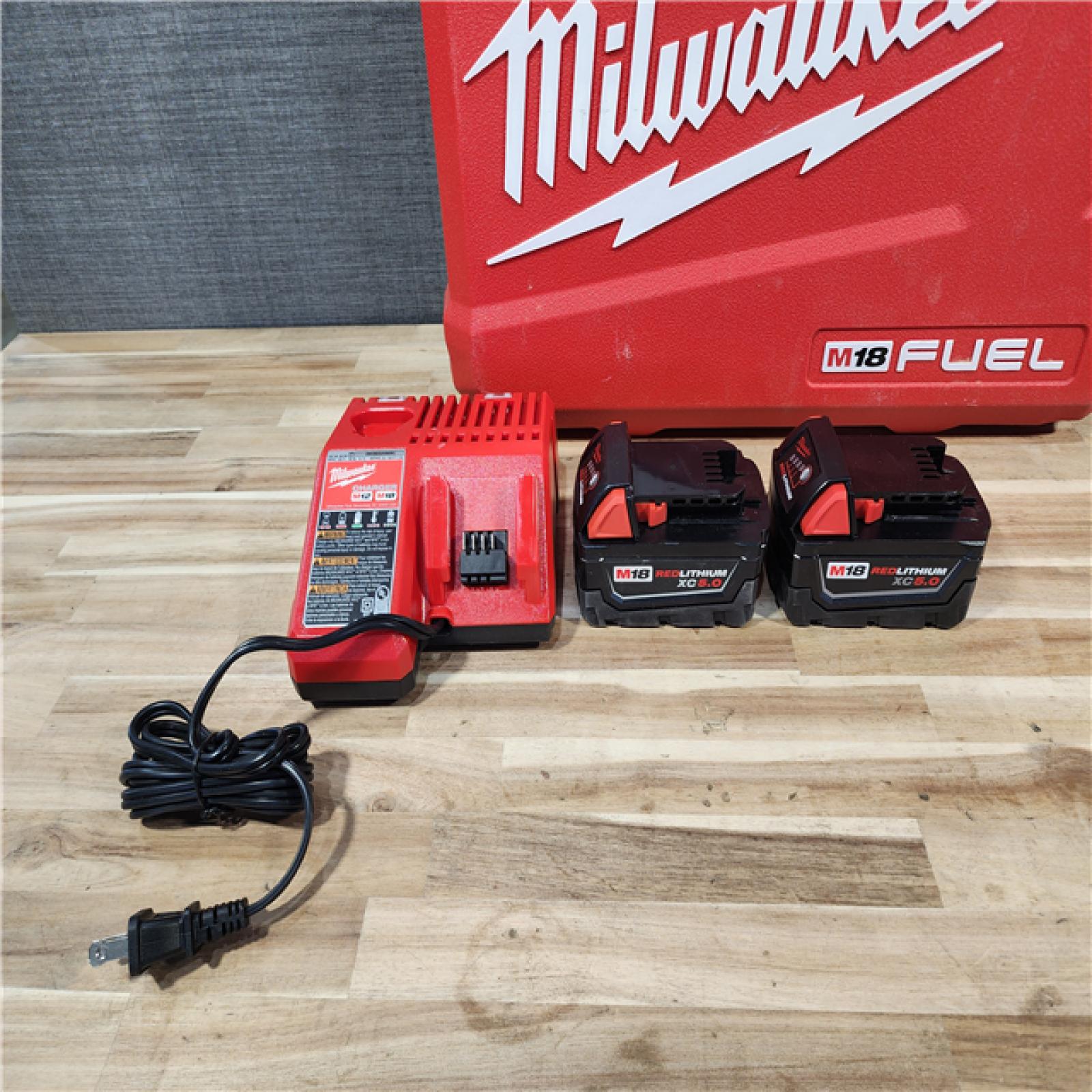 HOUSTON LOCATION - AS-IS Milwaukee  FUEL 18V Lithium-Ion Brushless Cordless Hammer Drill and Impact Driver Combo Kit