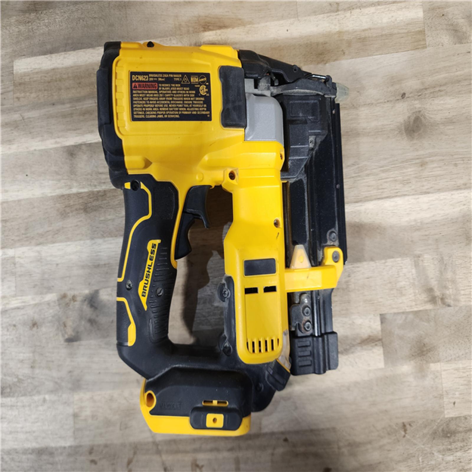 HOUSTON LOCATION - AS-IS DEWALT ATOMIC 20V MAX Lithium Ion Cordless 23 Gauge Pin Nailer Kit with 2.0Ah Battery and Charger