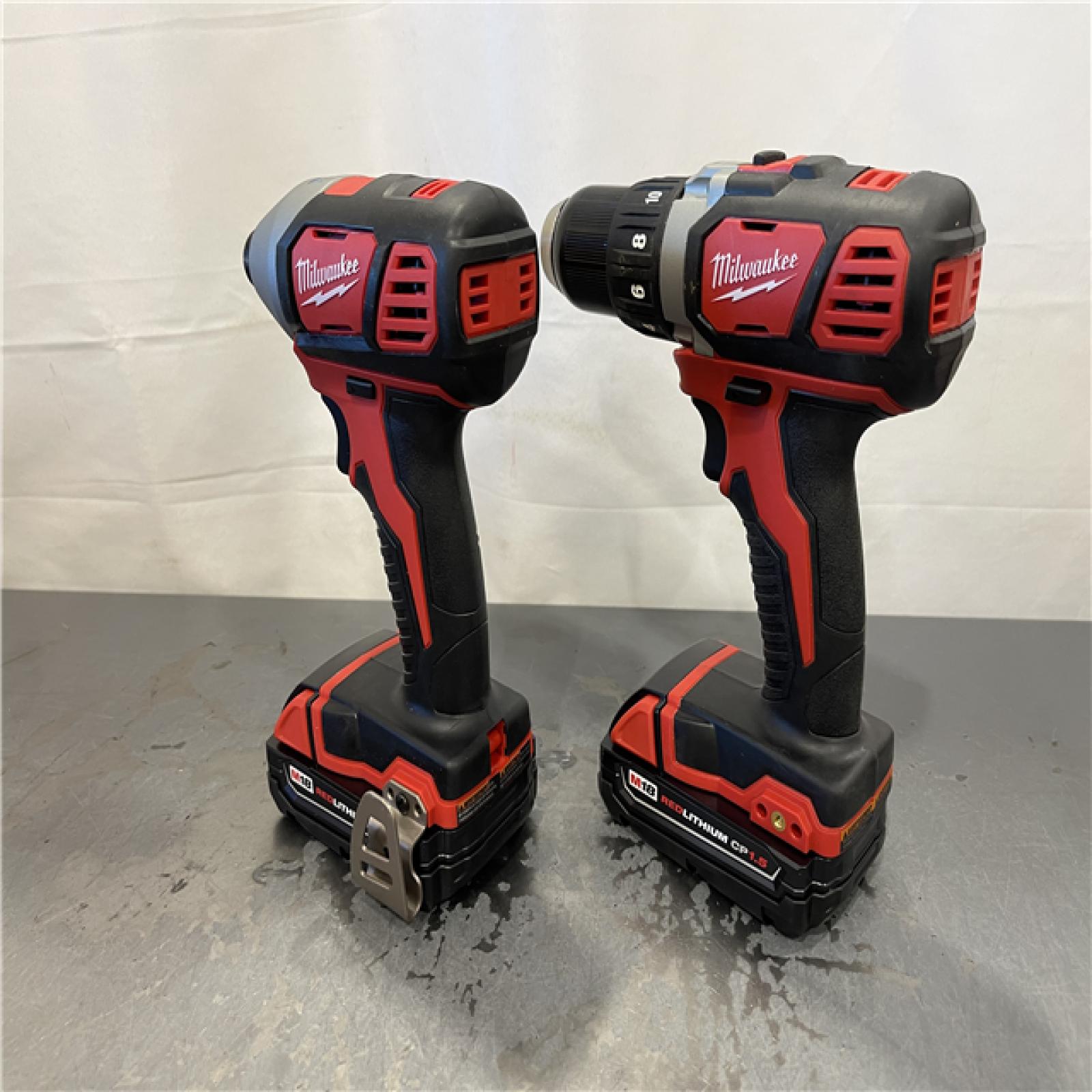 AS-IS - Milwaukee M18 18V Lithium-Ion Cordless Drill Driver/Impact Driver Combo Kit (2-Tool)