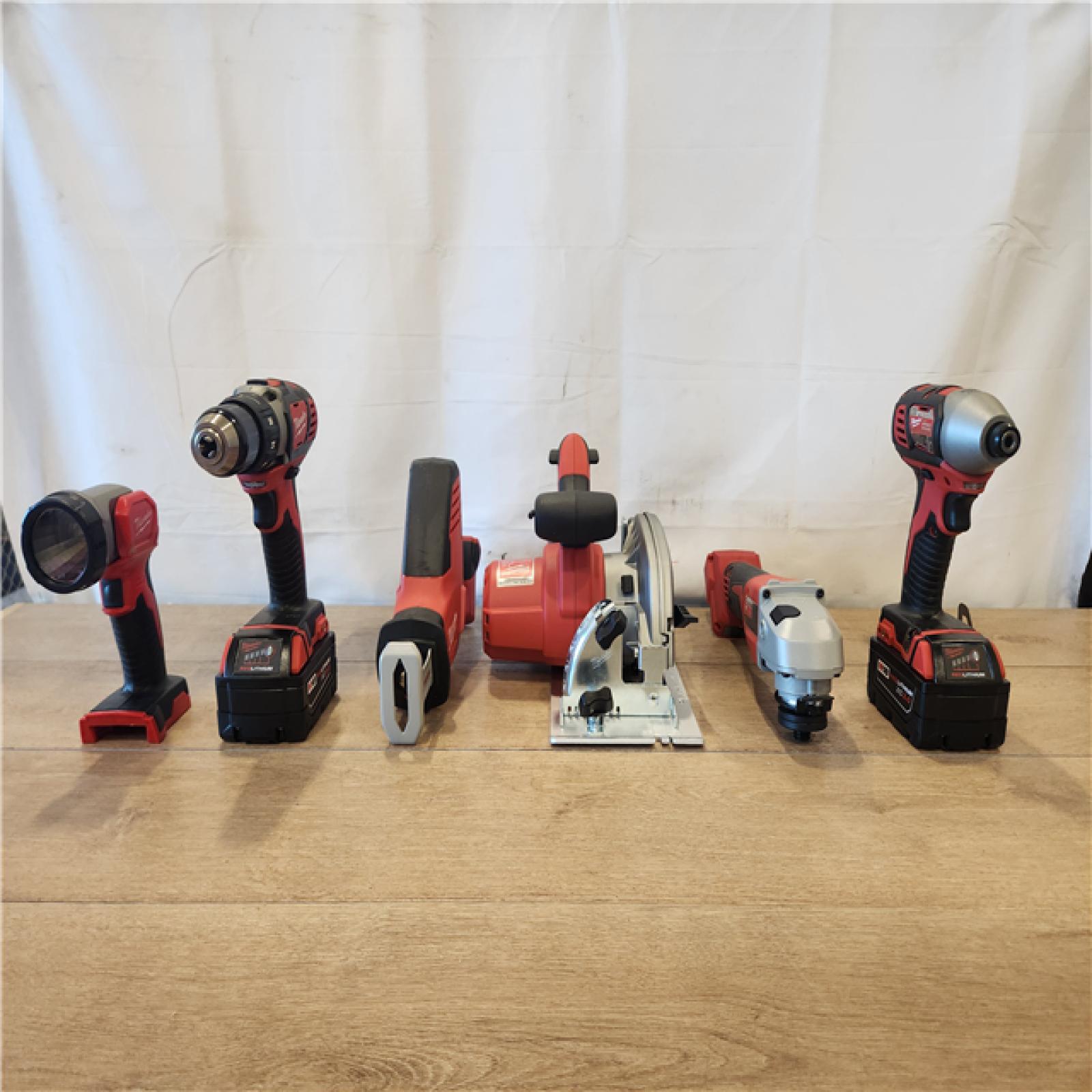 AS-IS- M18 18-Volt Lithium-Ion Cordless Combo Kit 7-Tool with 2-Batteries  Charger and Tool Bag