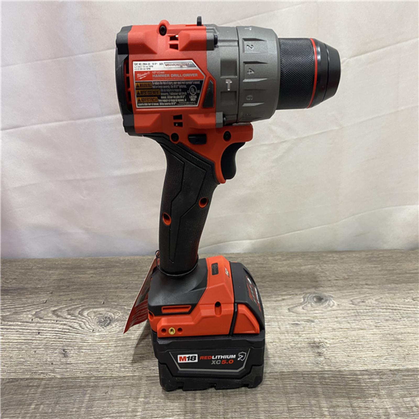 AS-IS Milwaukee FUEL 18V Lithium-Ion Brushless Cordless 1/2 in. Hammer Drill Driver Kit