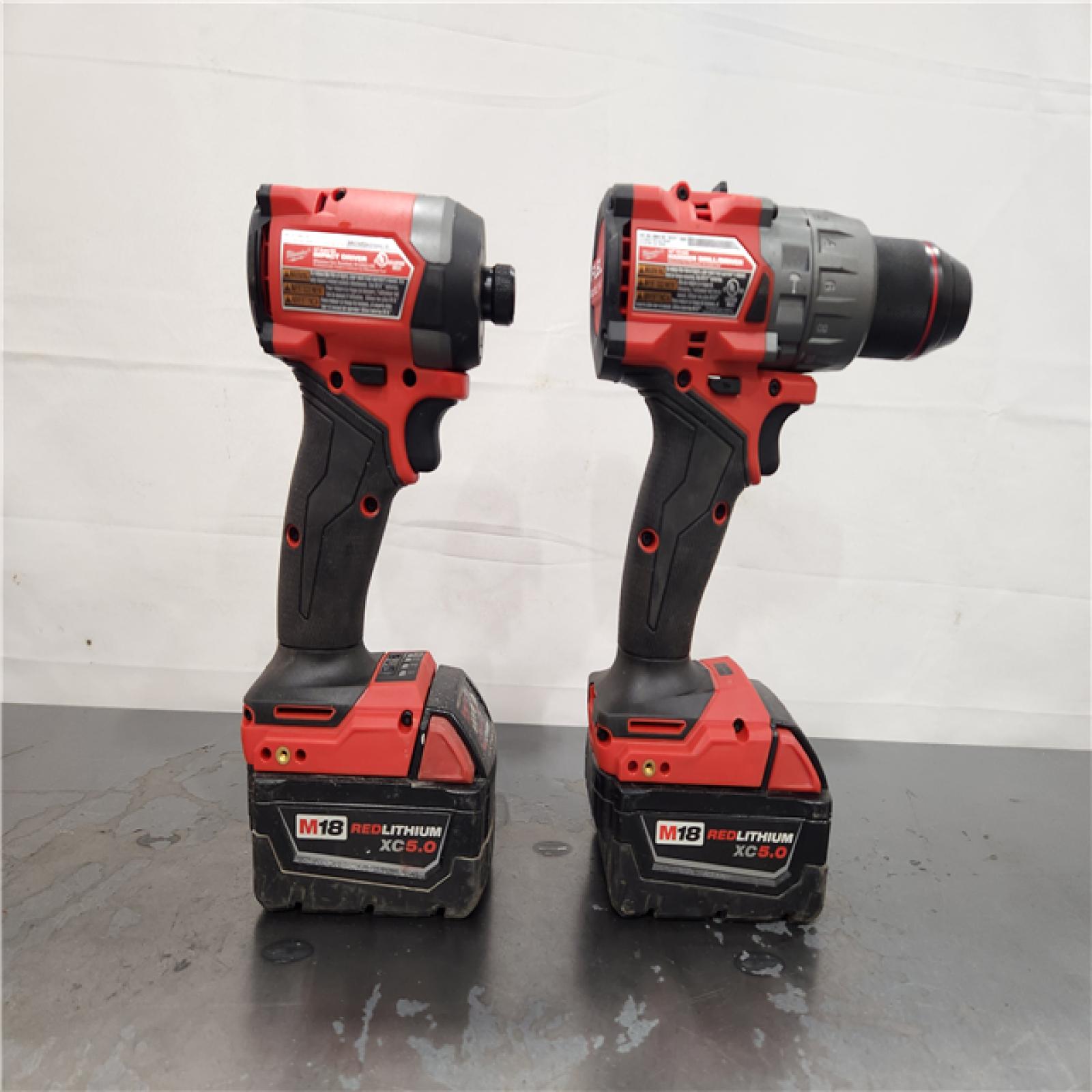 AS-IS- MILWAUKEE FUEL 18V Lithium-Ion Brushless Cordless Hammer Drill and Impact Driver Combo Kit