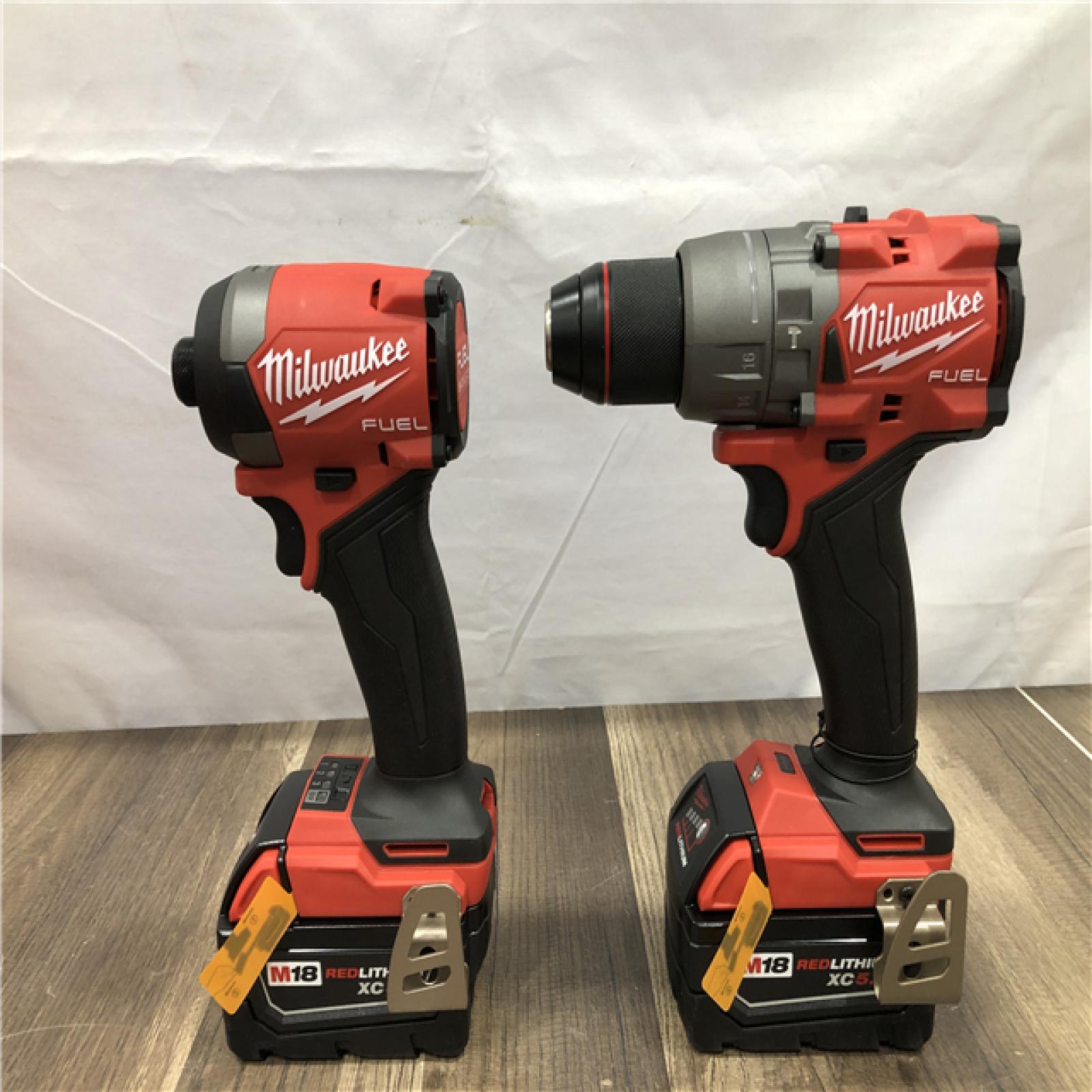 AS-IS Milwaukee FUEL 18V Lithium-Ion Brushless Cordless Hammer Drill and Impact Driver Combo Kit