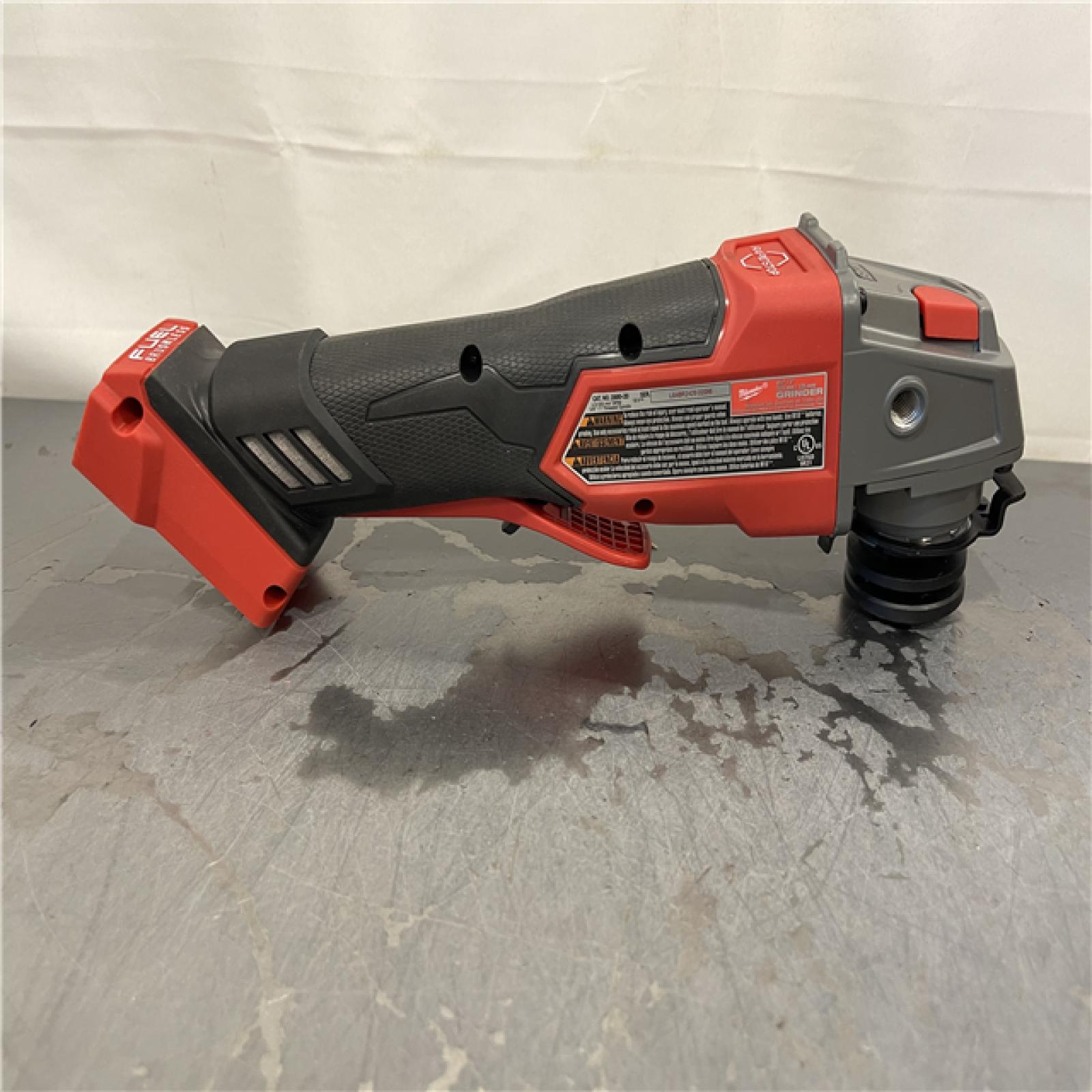 AS-IS - Milwaukee M18 FUEL 18V Lithium-Ion Brushless Cordless 4-1/2 in./5 in. Grinder w/Paddle Switch