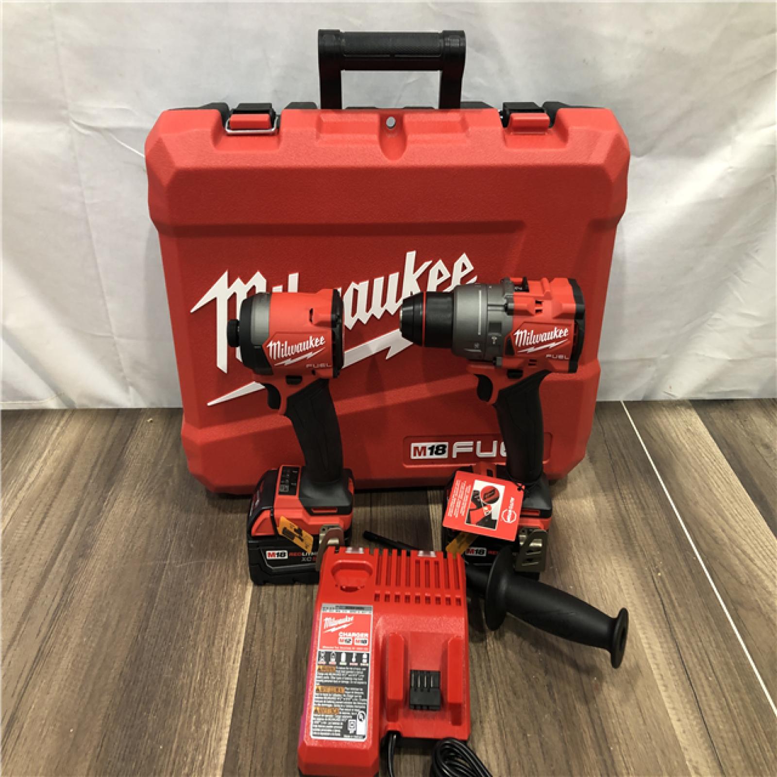 AS-IS Milwaukee  FUEL 18V Lithium-Ion Brushless Cordless Hammer Drill and Impact Driver Combo Kit