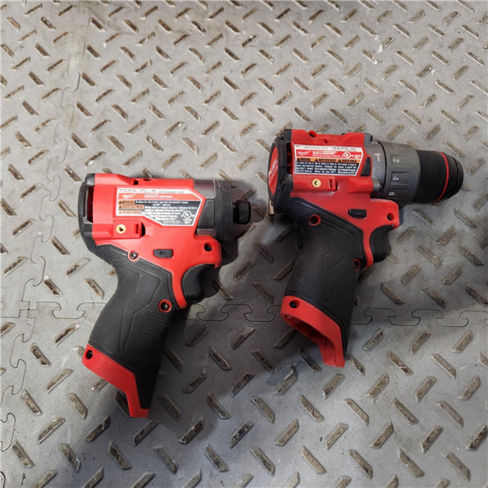 HOUSTON Location -AS-IS-Milwaukee 3497-22 12V Brushless Hammer Drill and Impact Driver Combo Kit APPEARS IN USED Condition