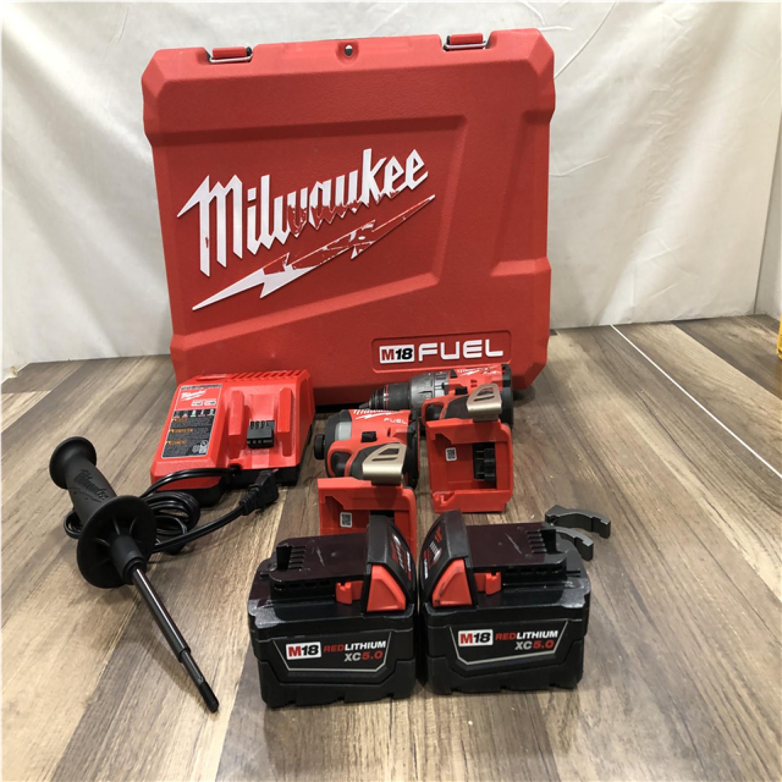AS-IS VMilwaukee FUEL 18V Lithium-Ion Brushless Cordless Hammer Drill and Impact Driver Combo Kit