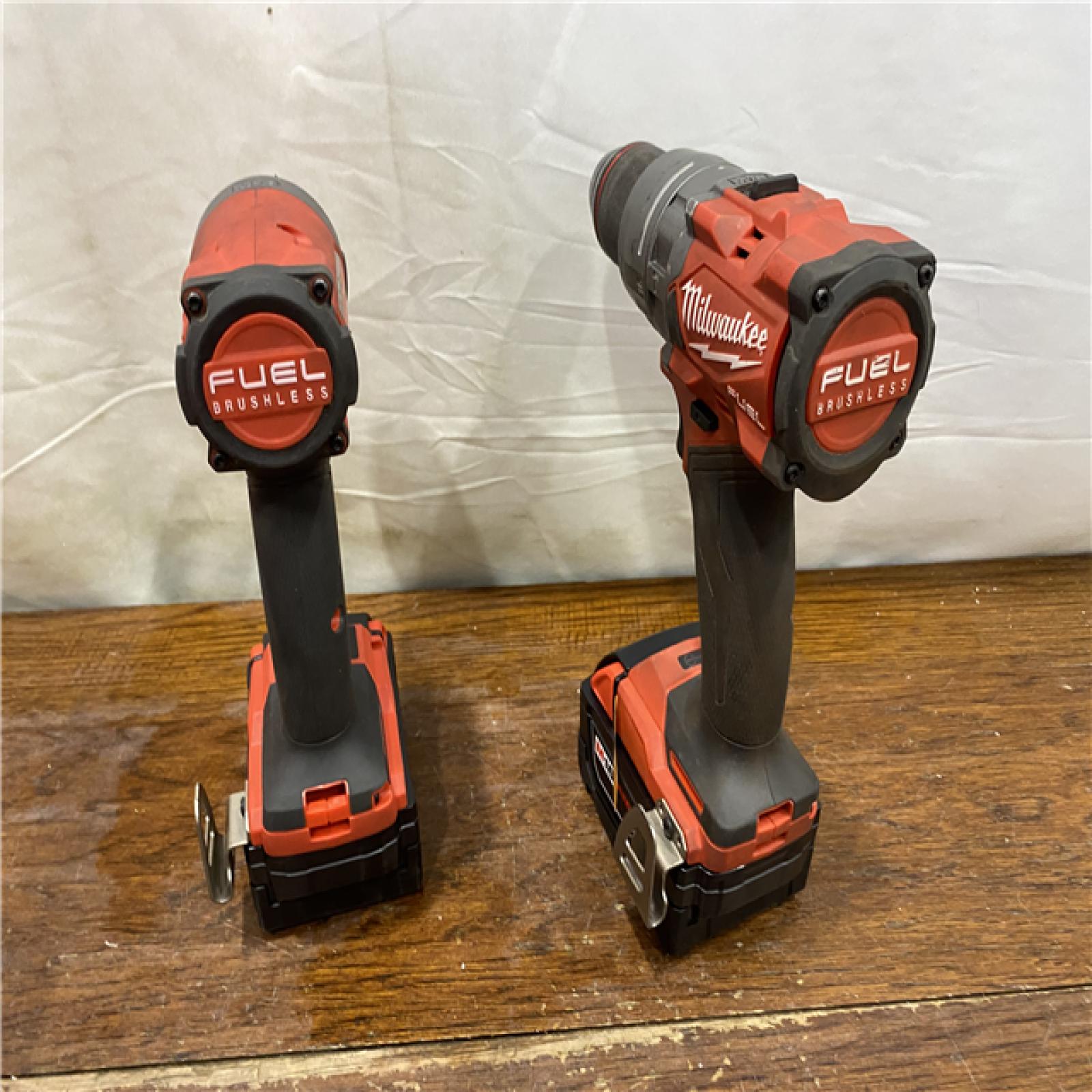 AS-IS MILWAUKEE M18 FUEL 18V Lithium-Ion Brushless Cordless Hammer Drill and Impact Driver Combo Kit (2-Tool) with 2 Batteries