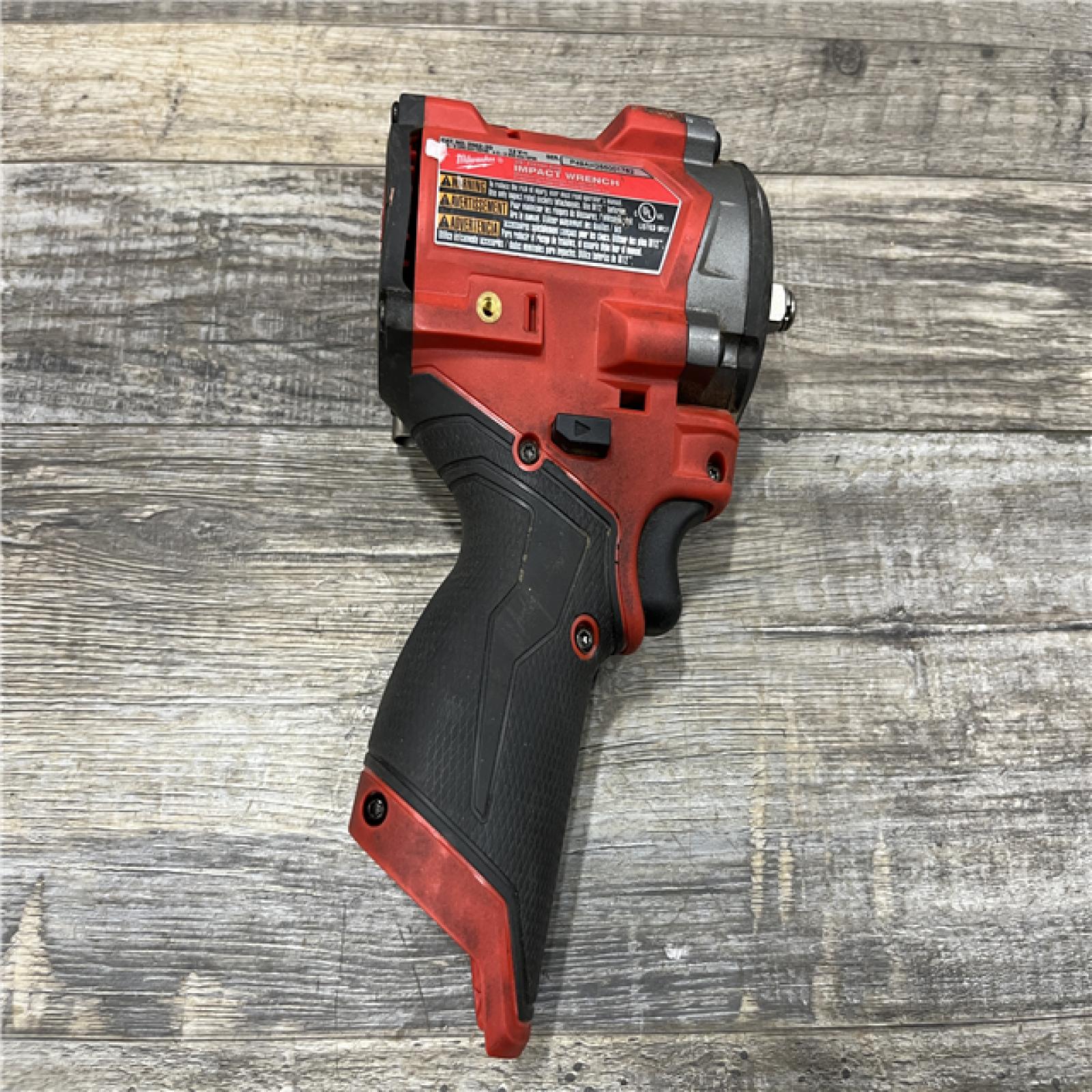 AS-IS Milwaukee FUEL 12V Lithium-Ion Brushless Cordless Stubby 3/8 in. Impact Wrench (Tool-Only)