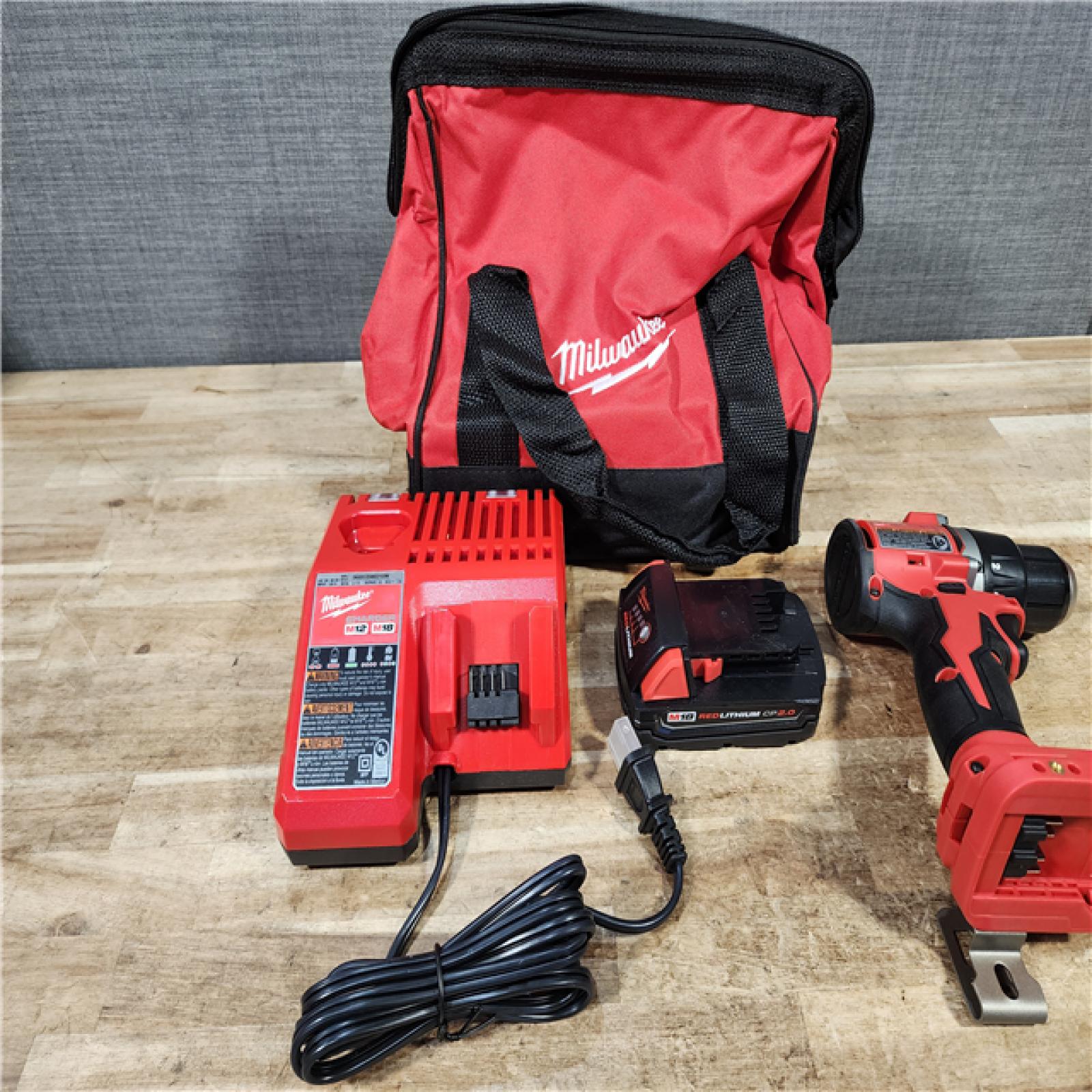 HOUSTON LOCATION - AS - IS Milwaukee 18V Lithium-Ion Brushless Cordless 1/2 in. Compact Drill/Driver with kit