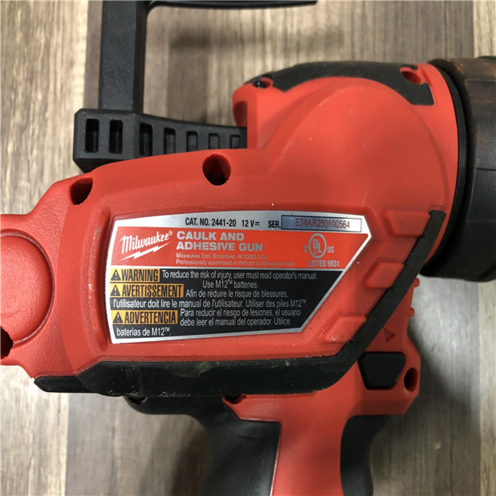 AS-IS Milwaukee 12V Lithium-Ion Cordless 10 oz. Adhesive and Caulk Gun (Tool-Only)