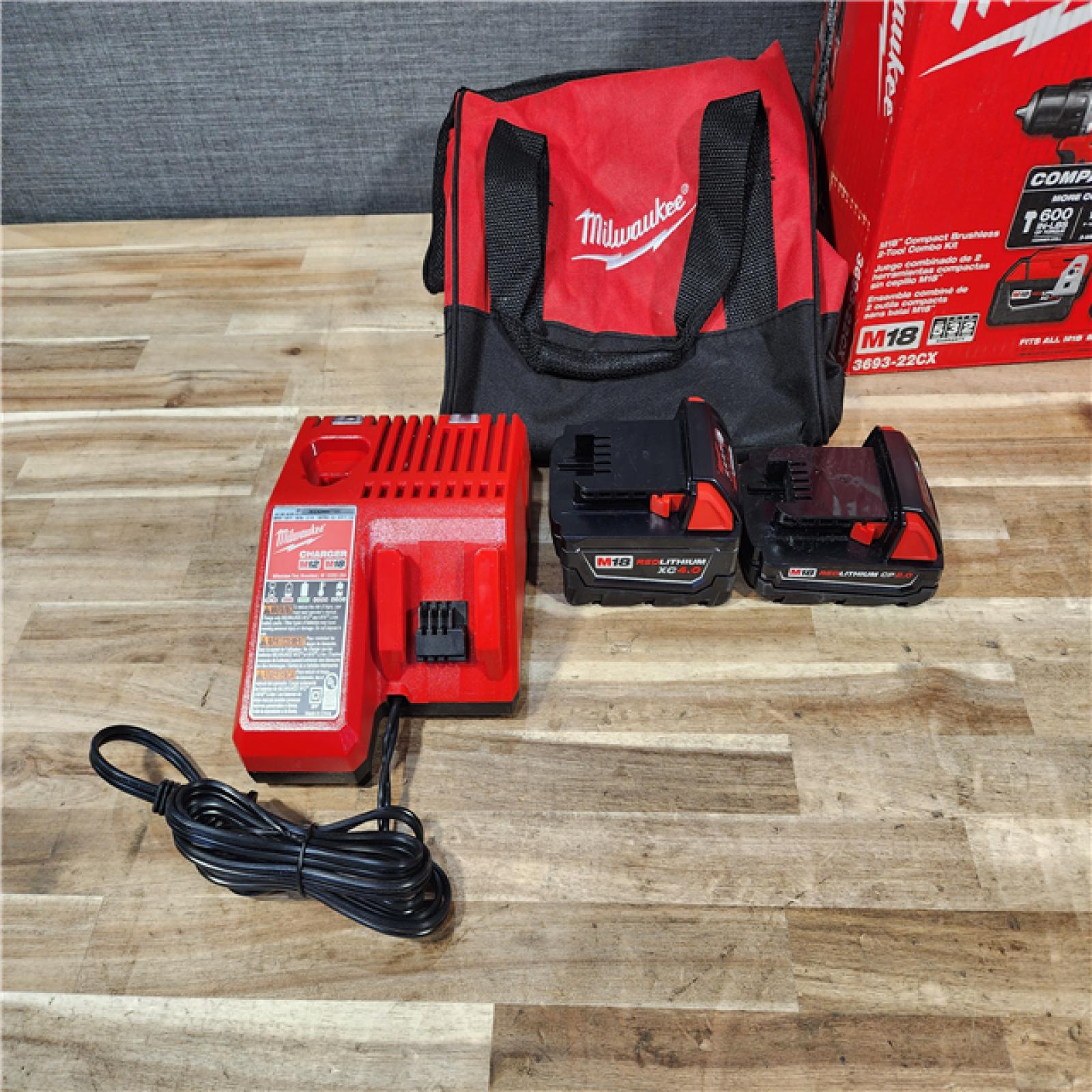 HOUSTON LOCATION - AS-IS M18 18-Volt Lithium-Ion Brushless Cordless Compact Hammer Drill/Impact Combo Kit (2-Tool) with (2) Batteries  Bag