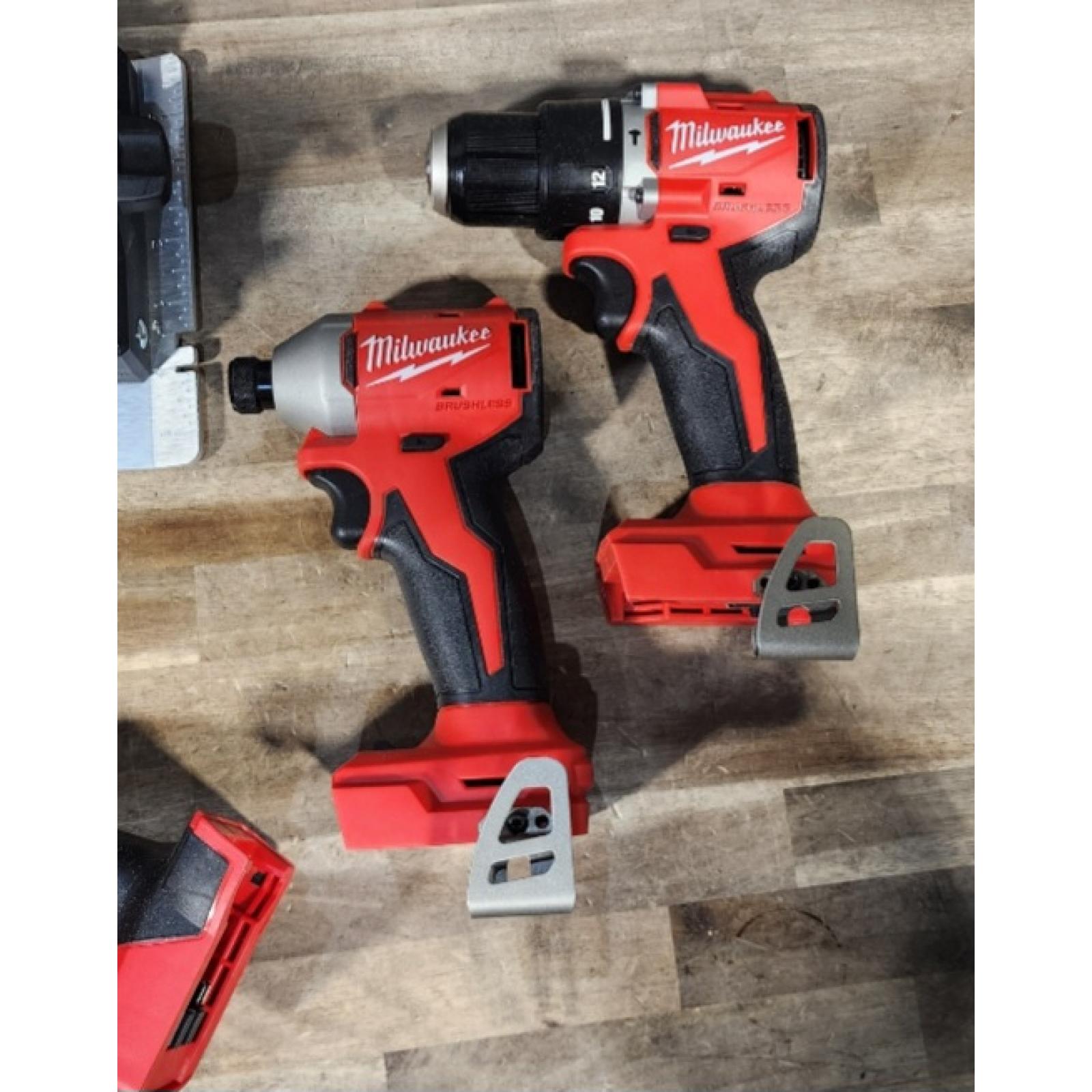 HOUSTON LOCATION - AS-IS Milwaukee M18 18-Volt Lithium-Ion Brushless Cordless Combo Kit (4-Tool) with 2-Batteries  1-Charger and Tool Bag