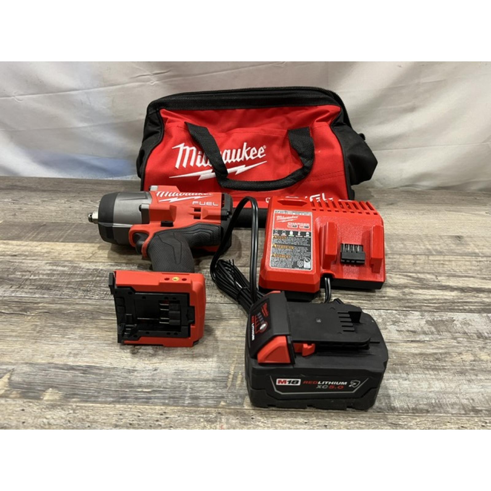 AS-IS Milwaukee FUEL 18V Lithium-Ion Brushless Cordless 1/2 in. Impact Wrench w/Friction Ring Kit