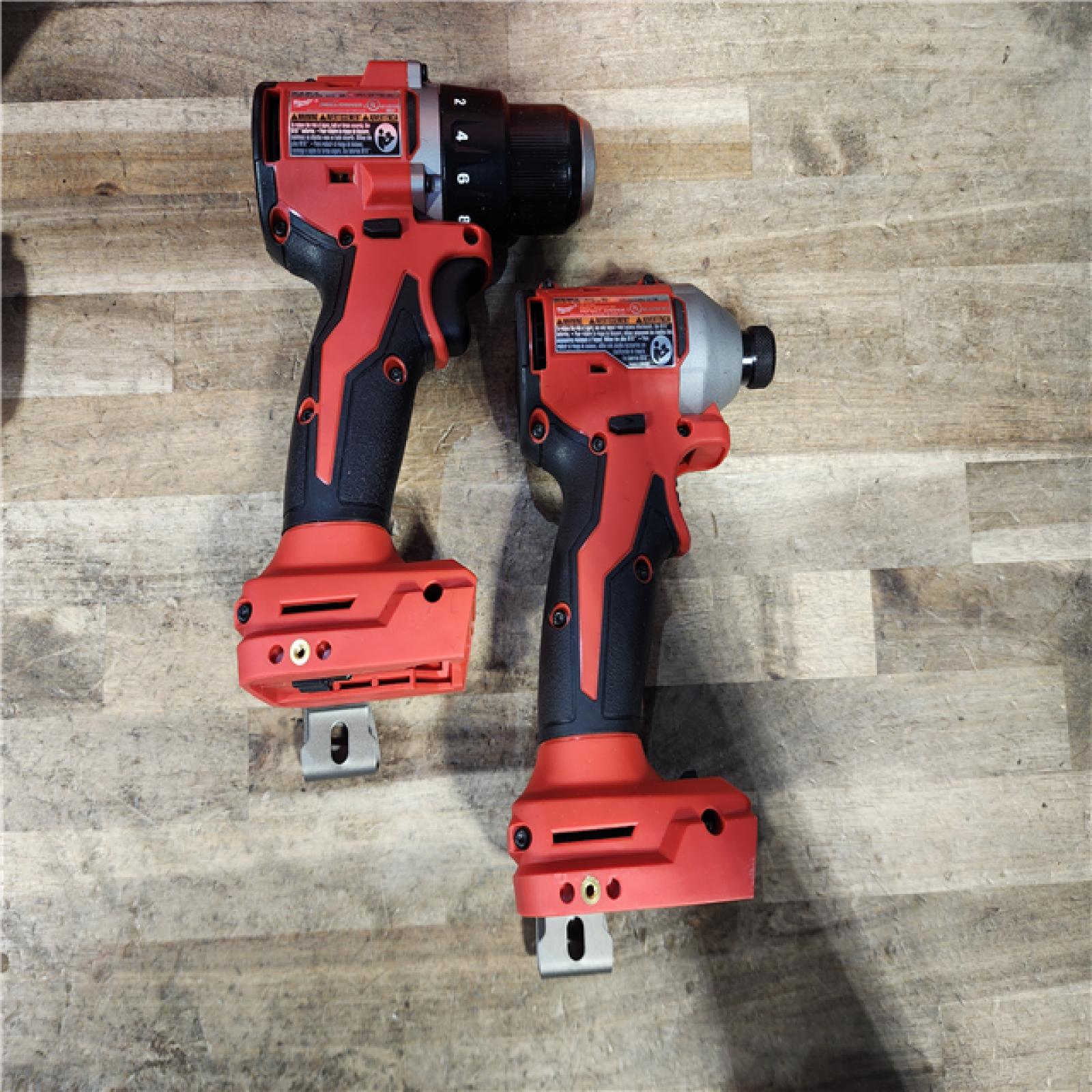 HOUSTON LOCATION - AS-IS Milwaukee M18 18V Lithium-Ion Brushless Cordless Compact Drill/Impact Combo Kit (2-Tool) W/(2) 2.0 Ah Batteries  Charger & Bag