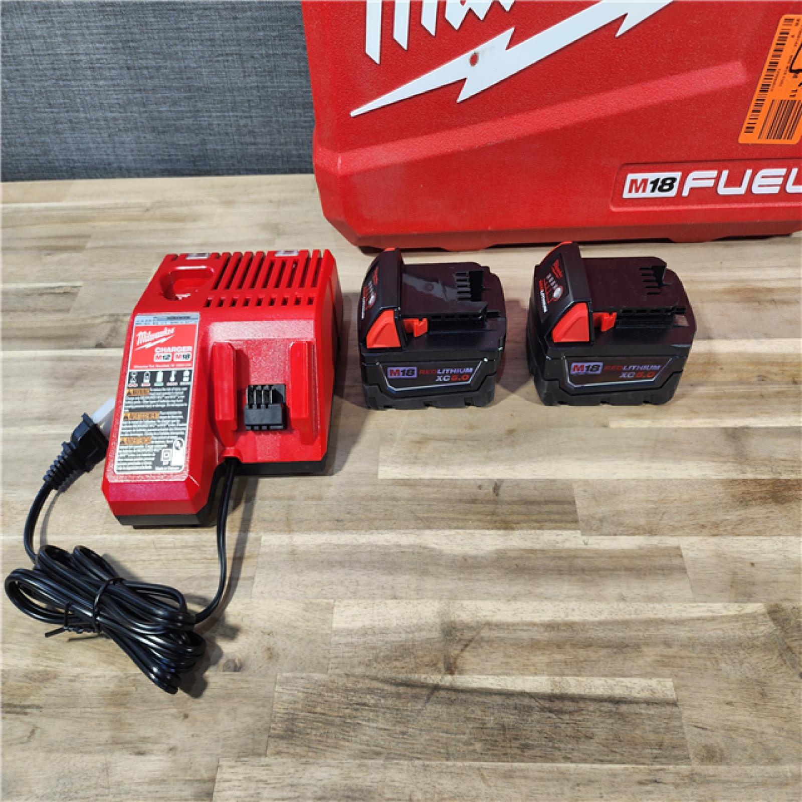 HOUSTON LOCATION - AS-IS MILWAUKEE M18 FUEL 18V Lithium-Ion Brushless Cordless Hammer Drill and Impact Driver Combo Kit (2-Tool) with 2 Batteries