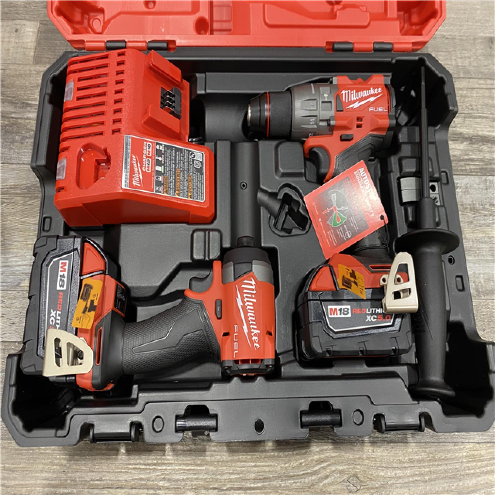 AS-IS Milwaukee 18V Lithium-Ion Brushless Cordless Hammer Drill and Impact Driver Combo Kit