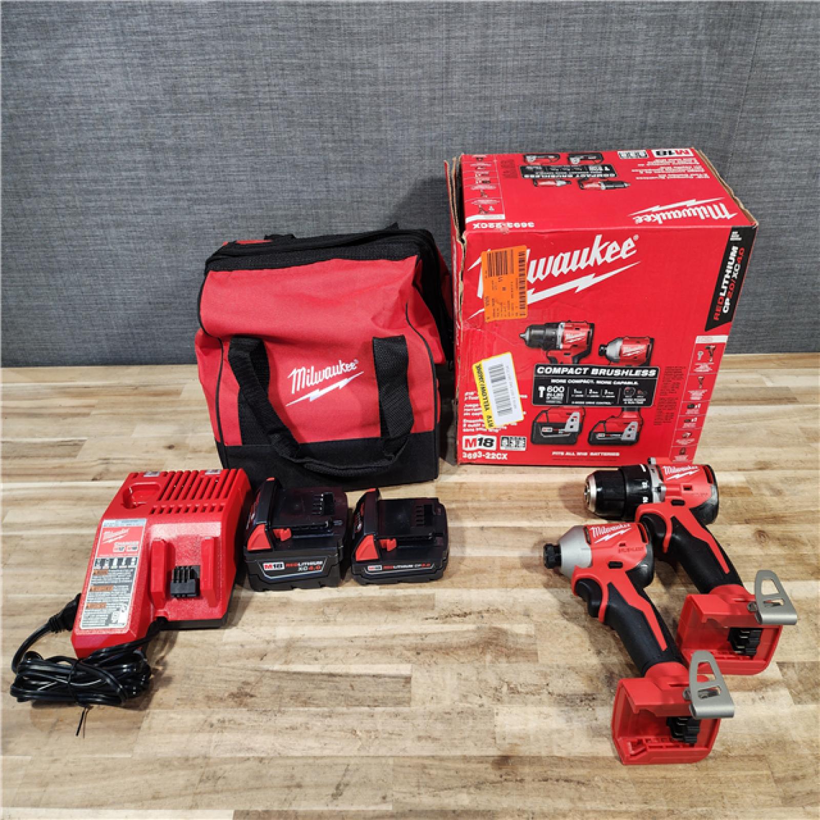 HOUSTON LOCATION - AS-IS Milwaukee 18-Volt Lithium-Ion Brushless Cordless Compact Hammer Drill/Impact Combo Kit